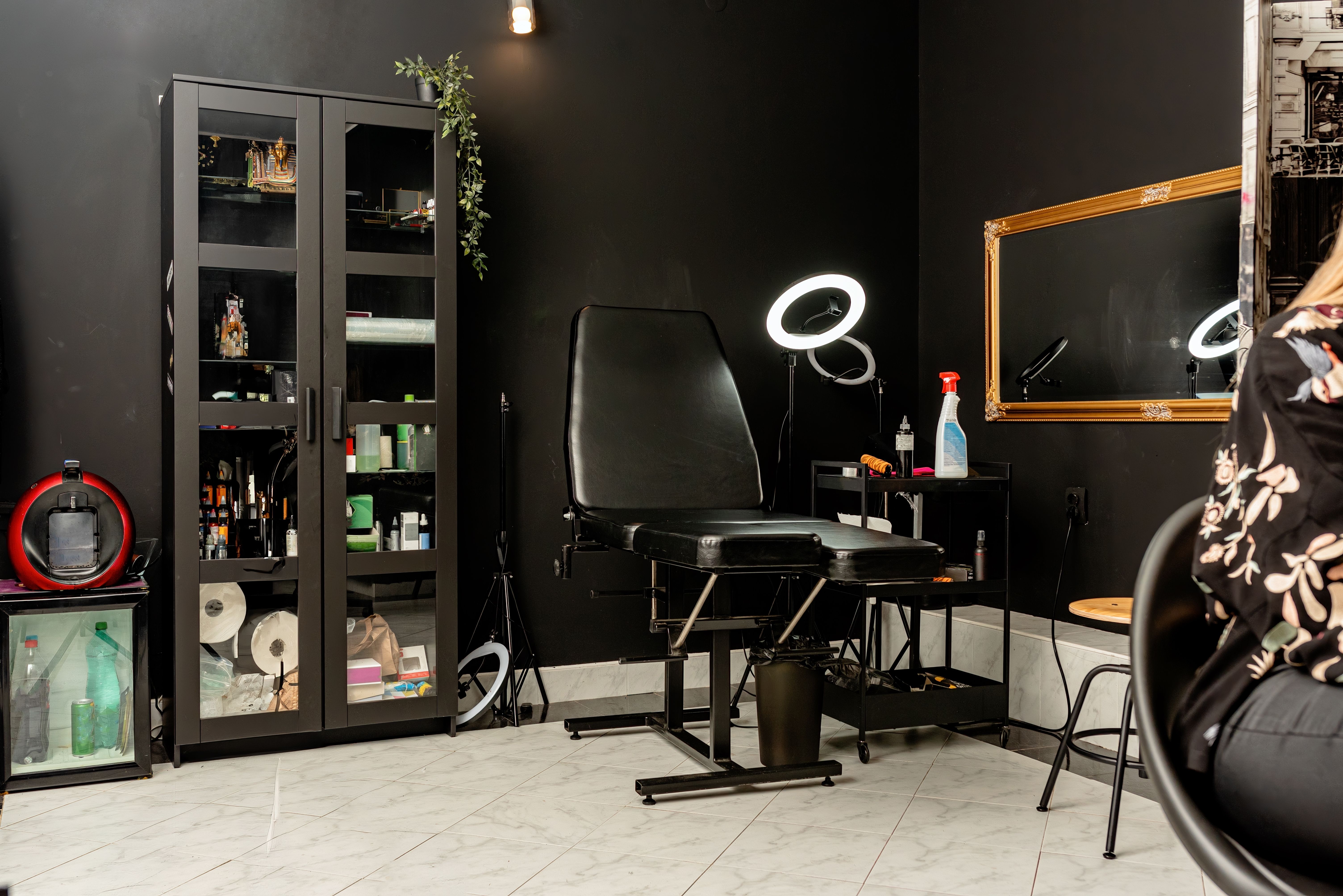 Tattoo studio interior with furniture and equipment ready for use