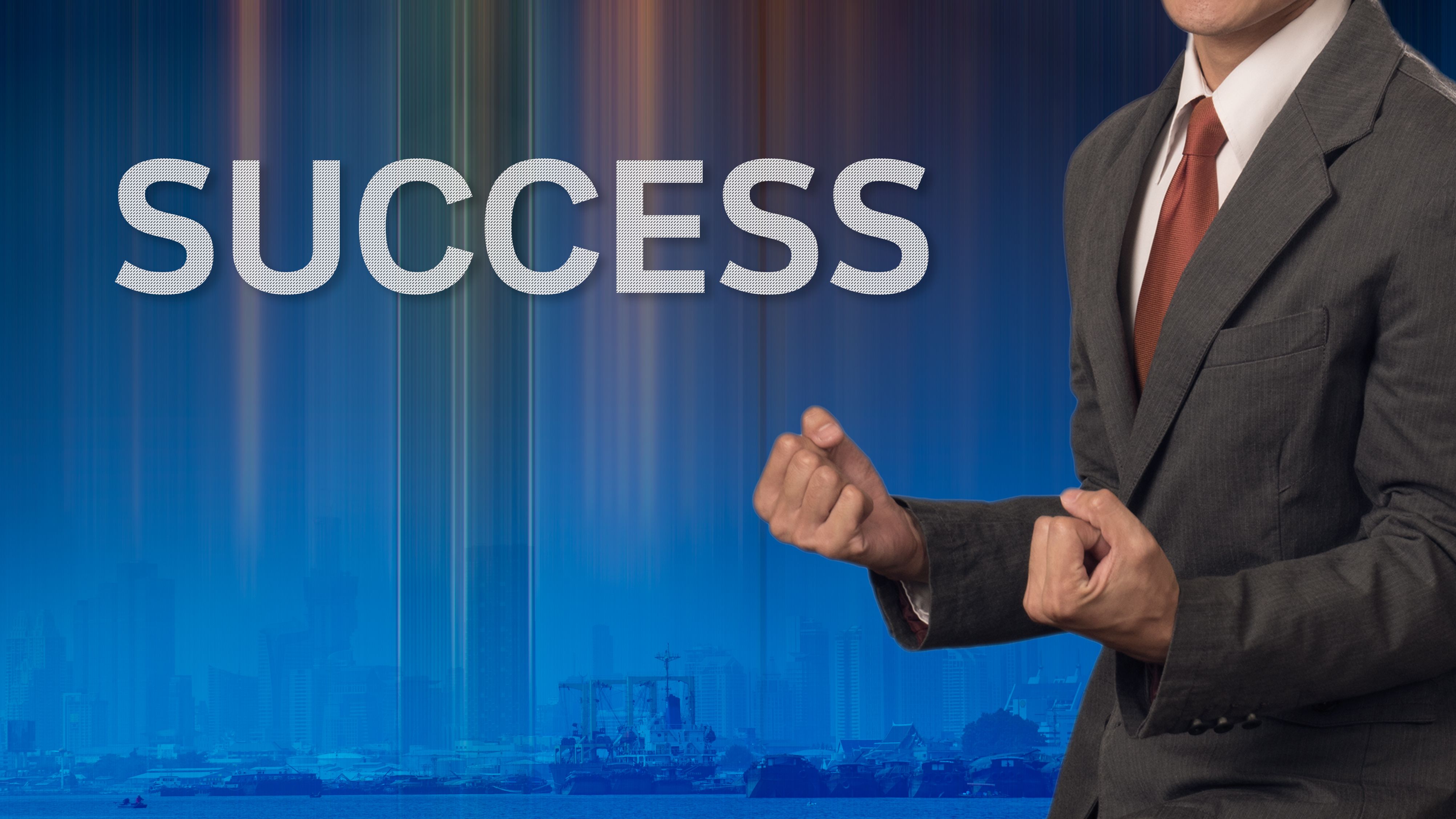 business man celebrate with wording - success concept