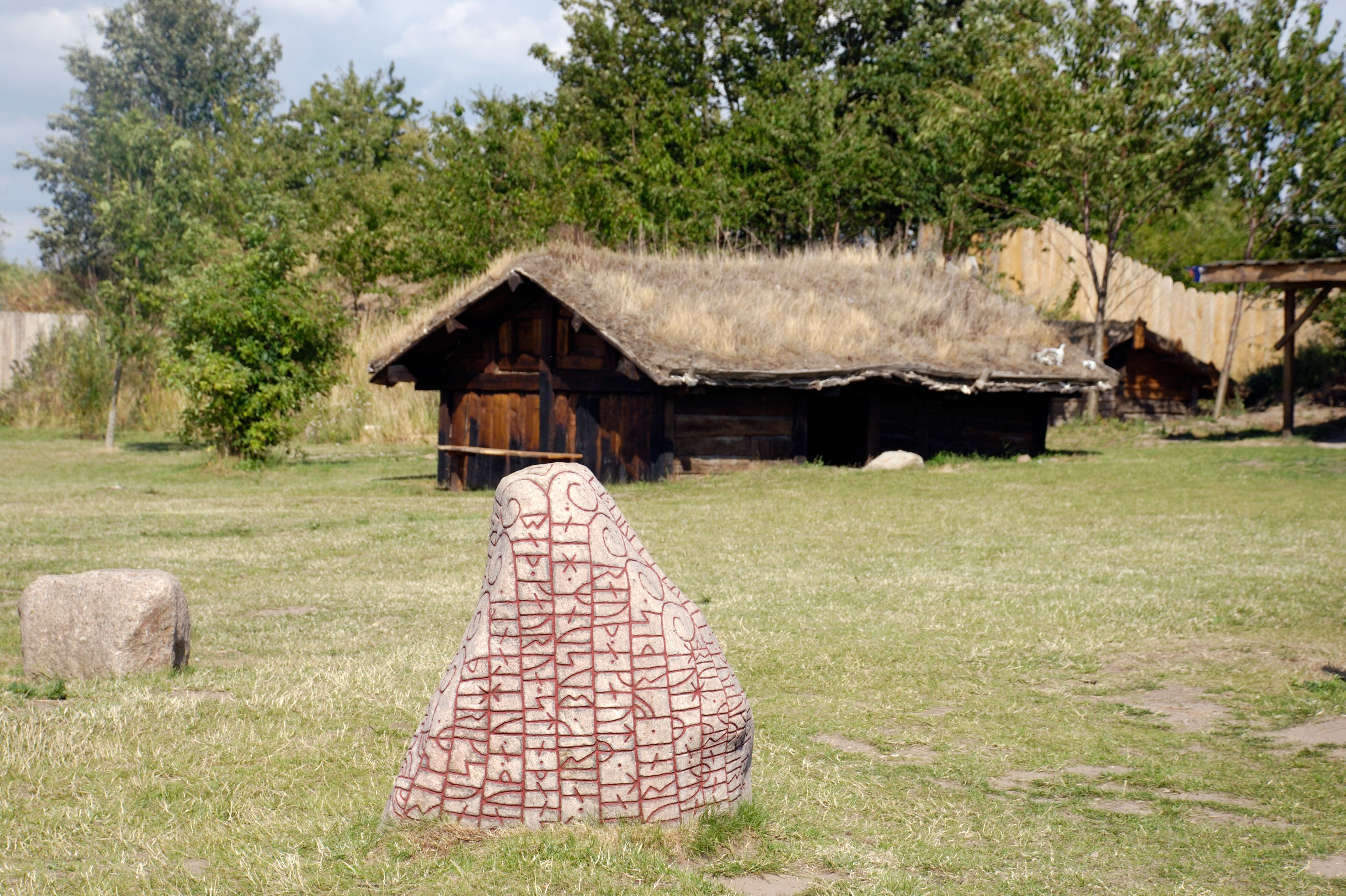 Rune stone and viking age building