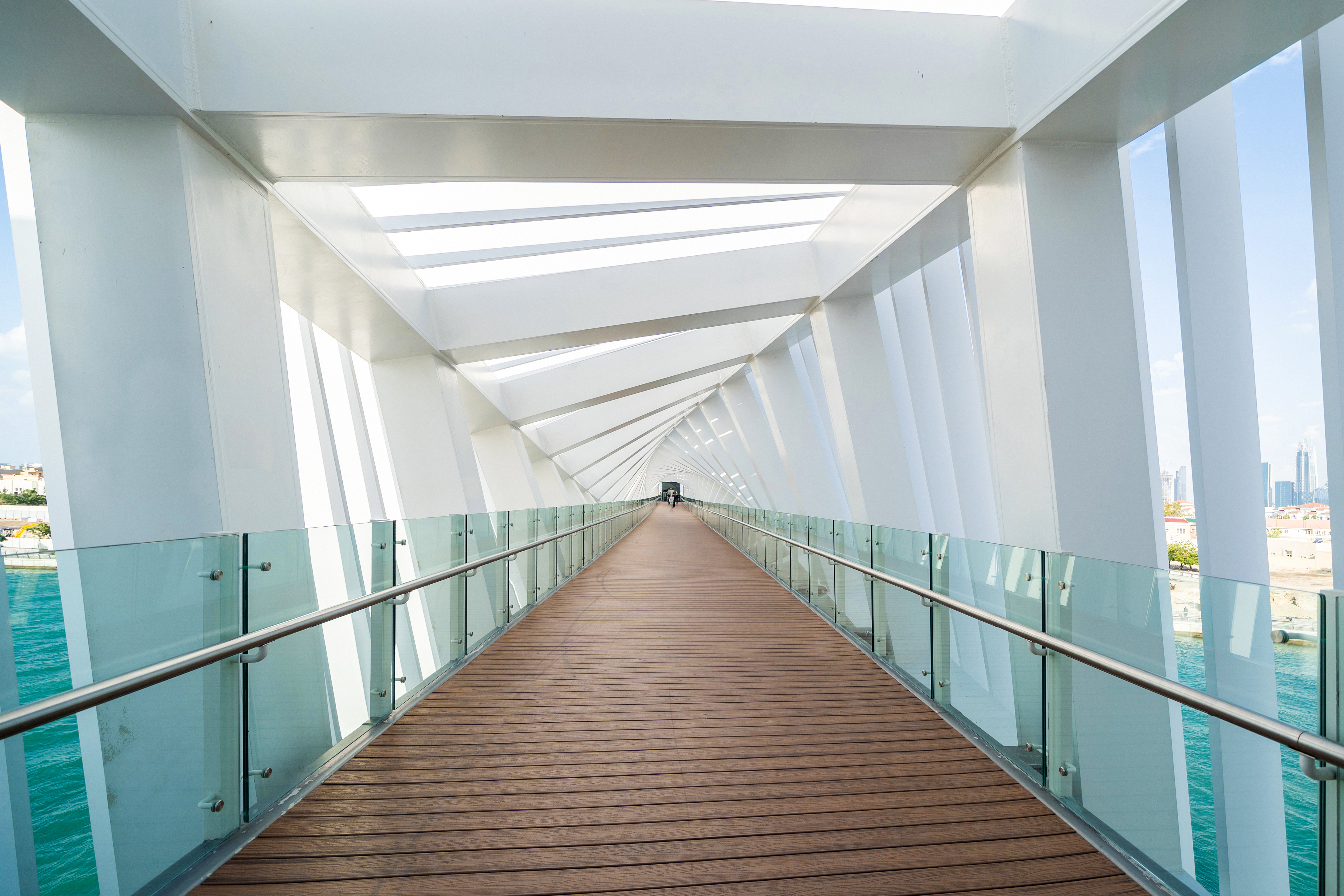 Interior design decoration of structure of twisted Bridge. Structure in Dubai, United Arab Emirates or UAE. Wooden floor in tunnel. Architecture background. Hall corridor in futuristic empty room.