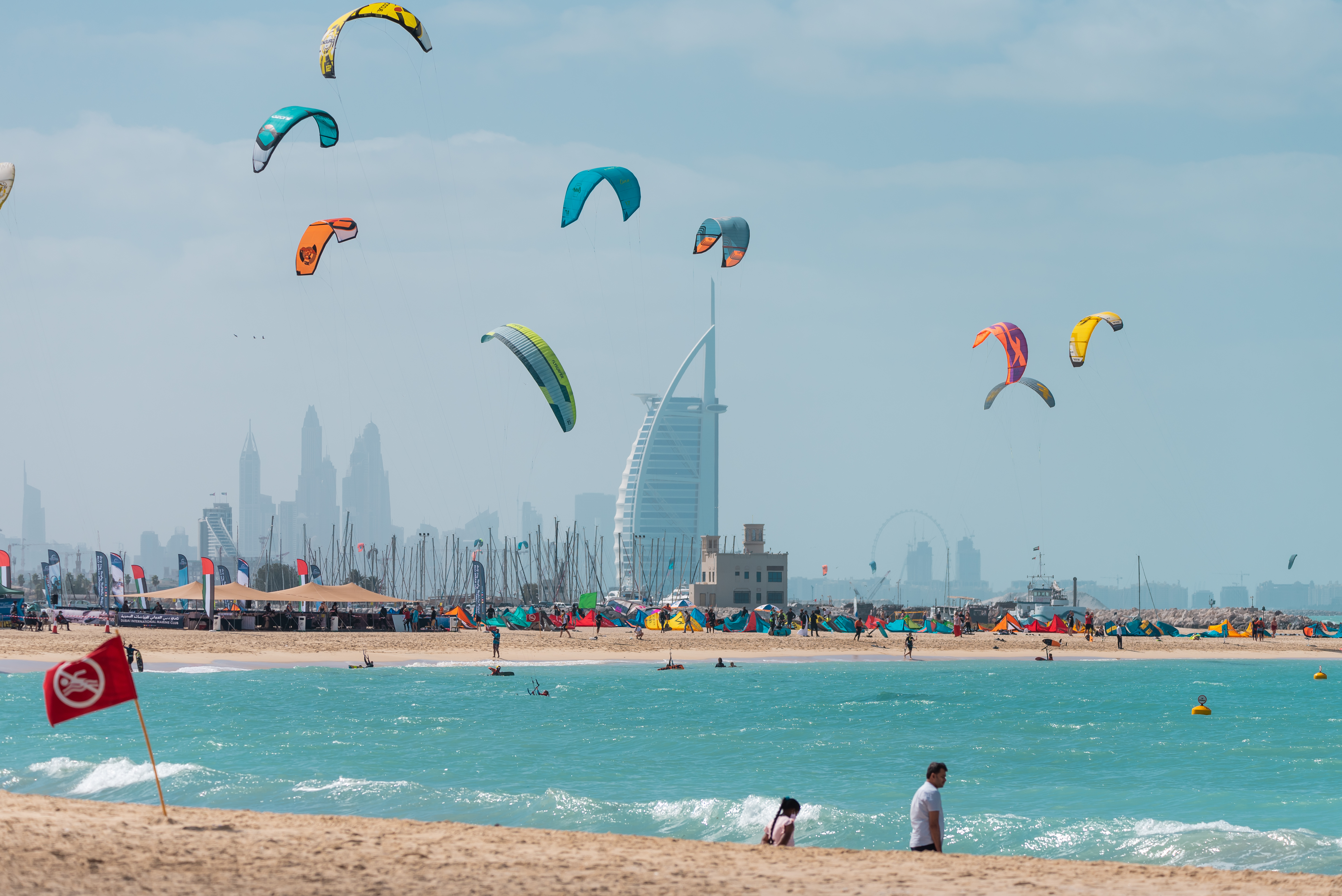 A view of colorful kite belonging to Kite surfers flying over Kite beach in the sky of Dubai