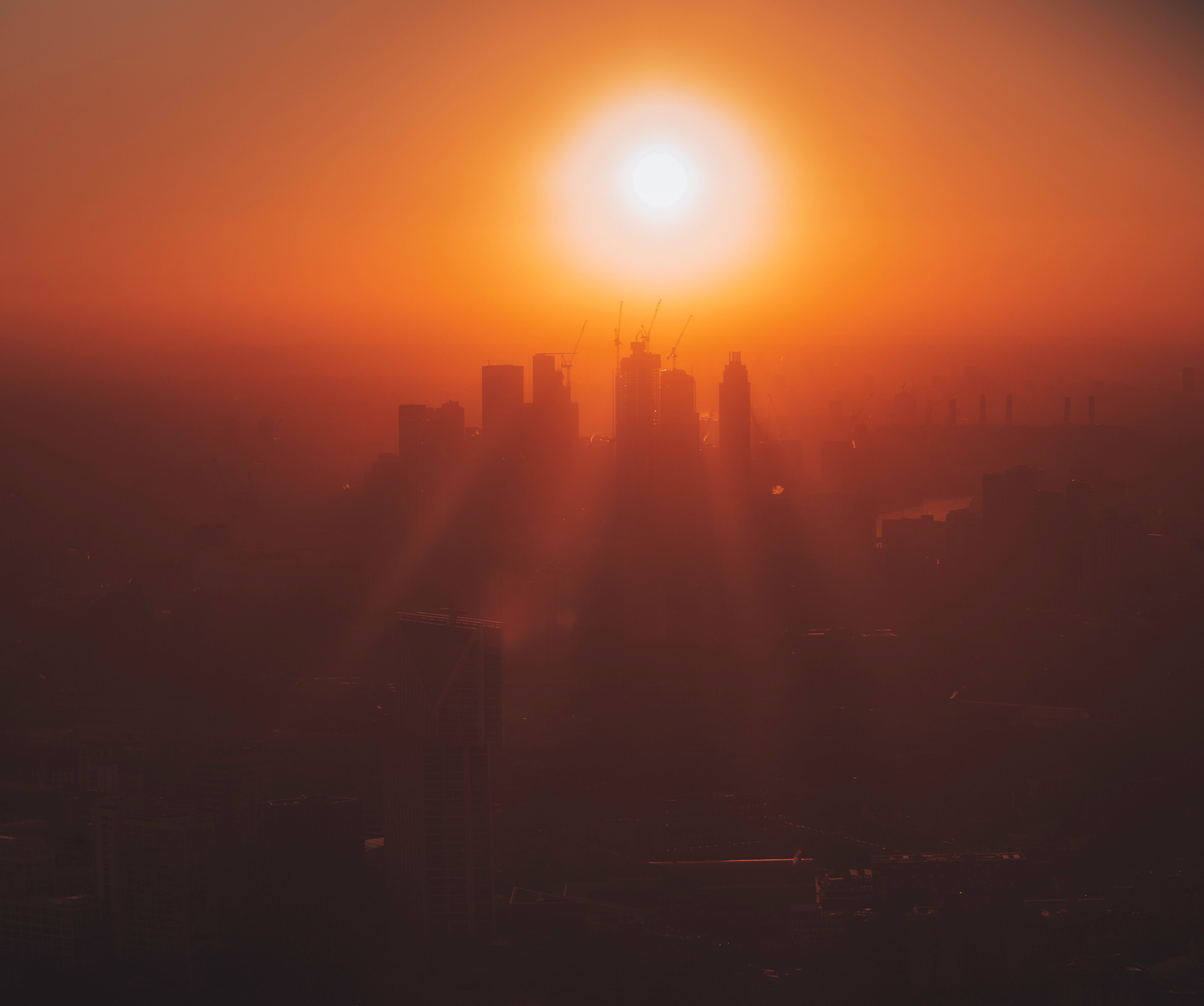 Sunset over London on misty day