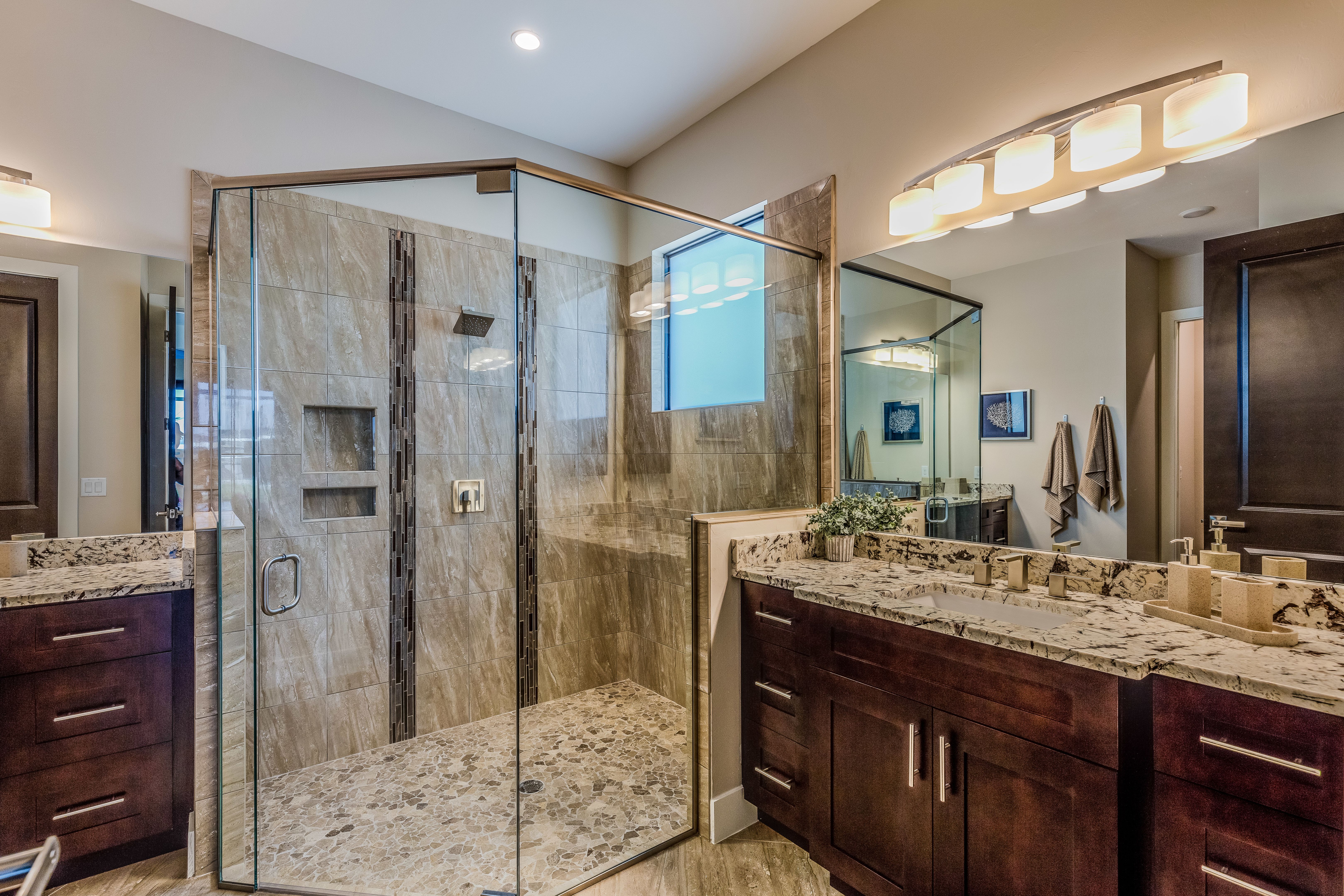 Shower in corner of master bathroom
