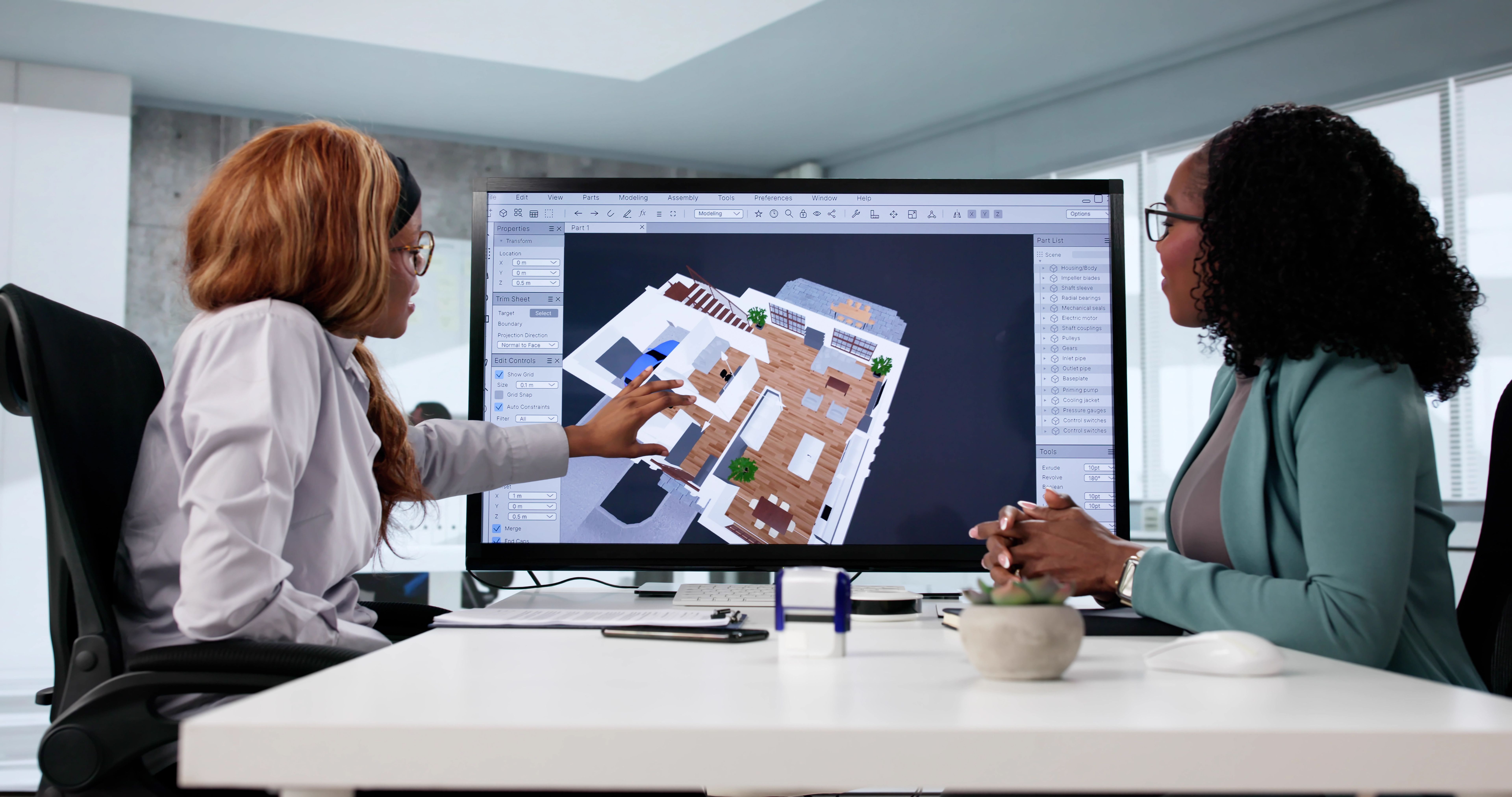 Young woman using CAD software