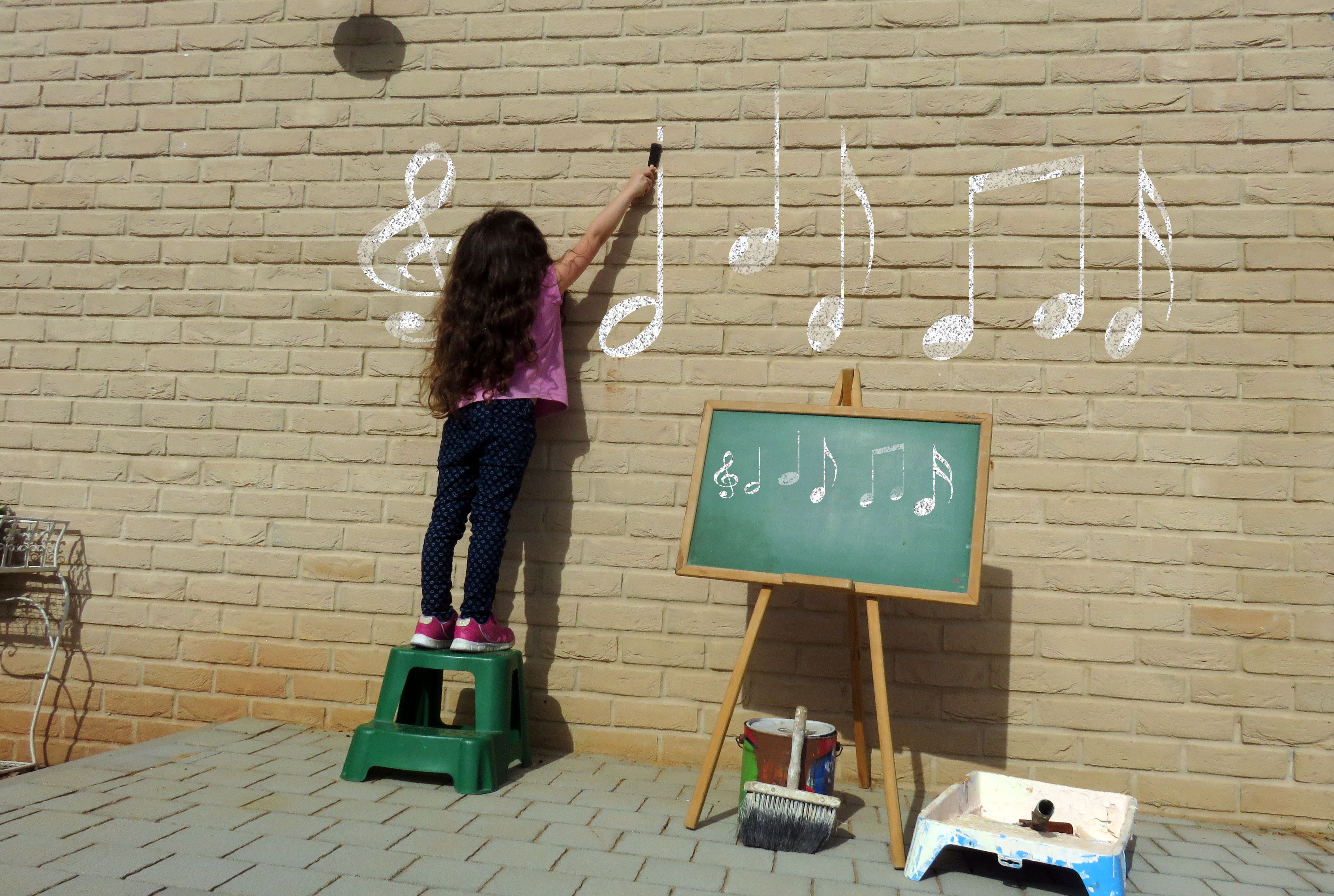 child composing music