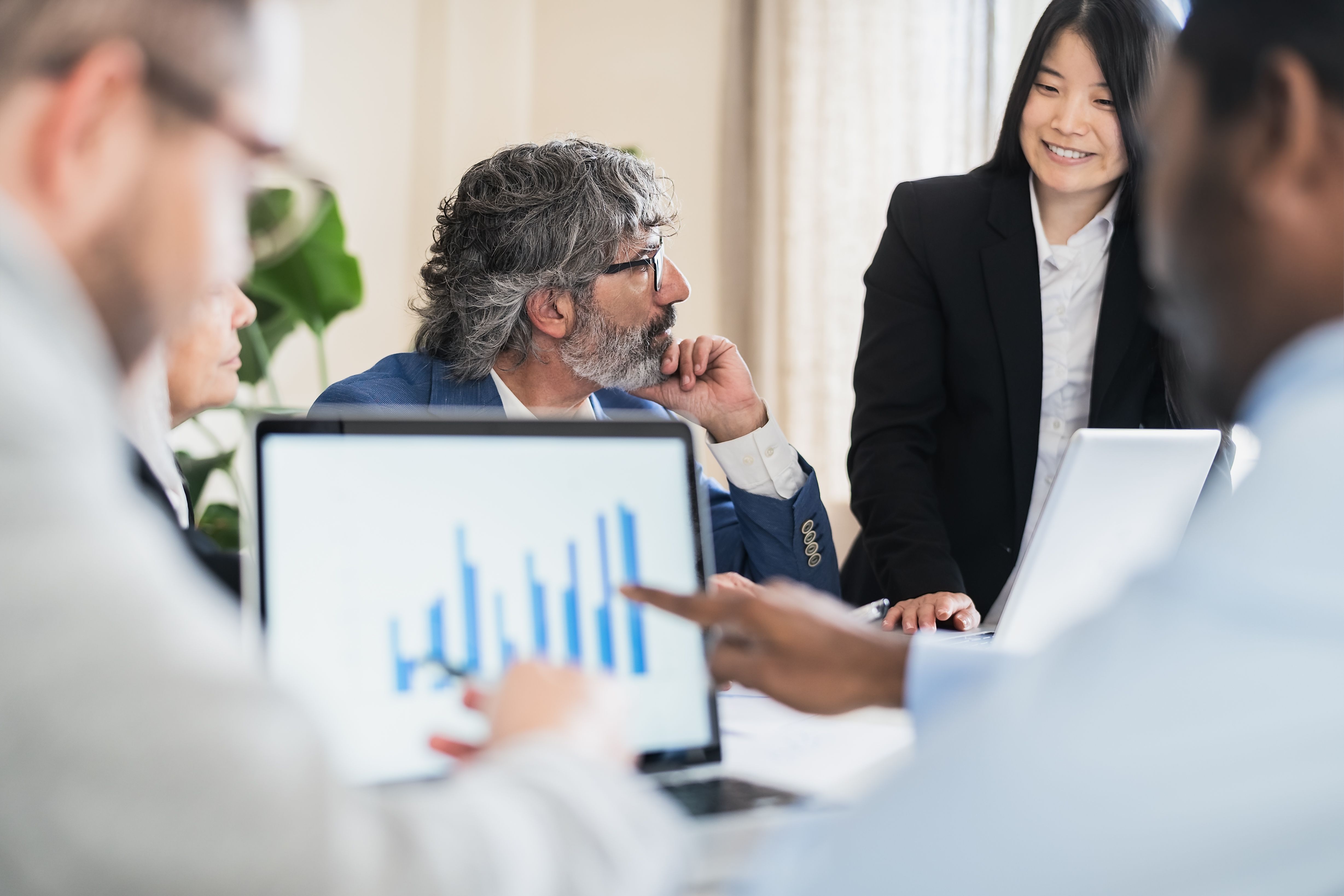 Multiracial business people working on financial markets in modern office - Entrepreneurship concept Multiracial business people working on financial markets in modern office - Entrepreneurship concept