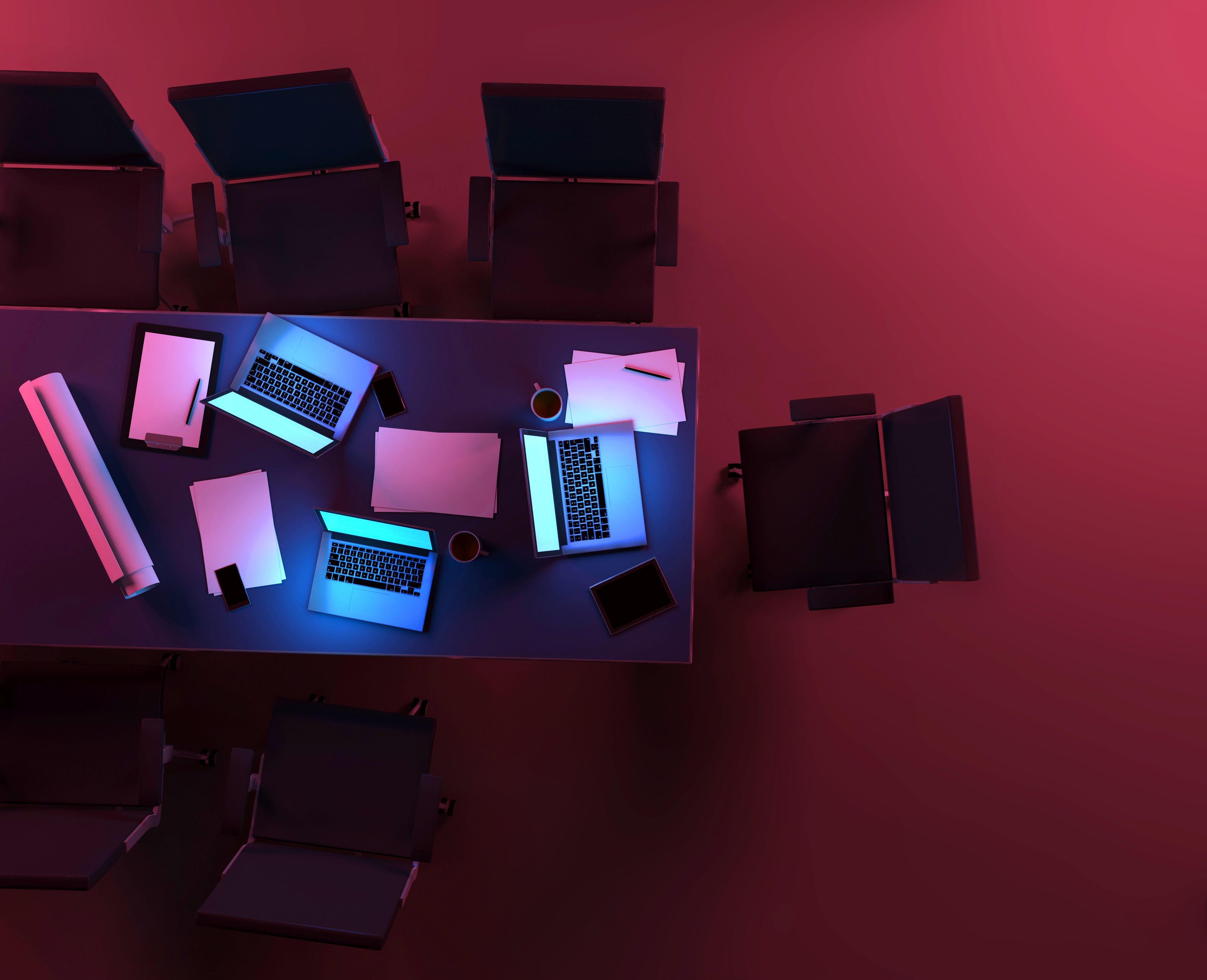 Office interior at night with active computers, overhead view