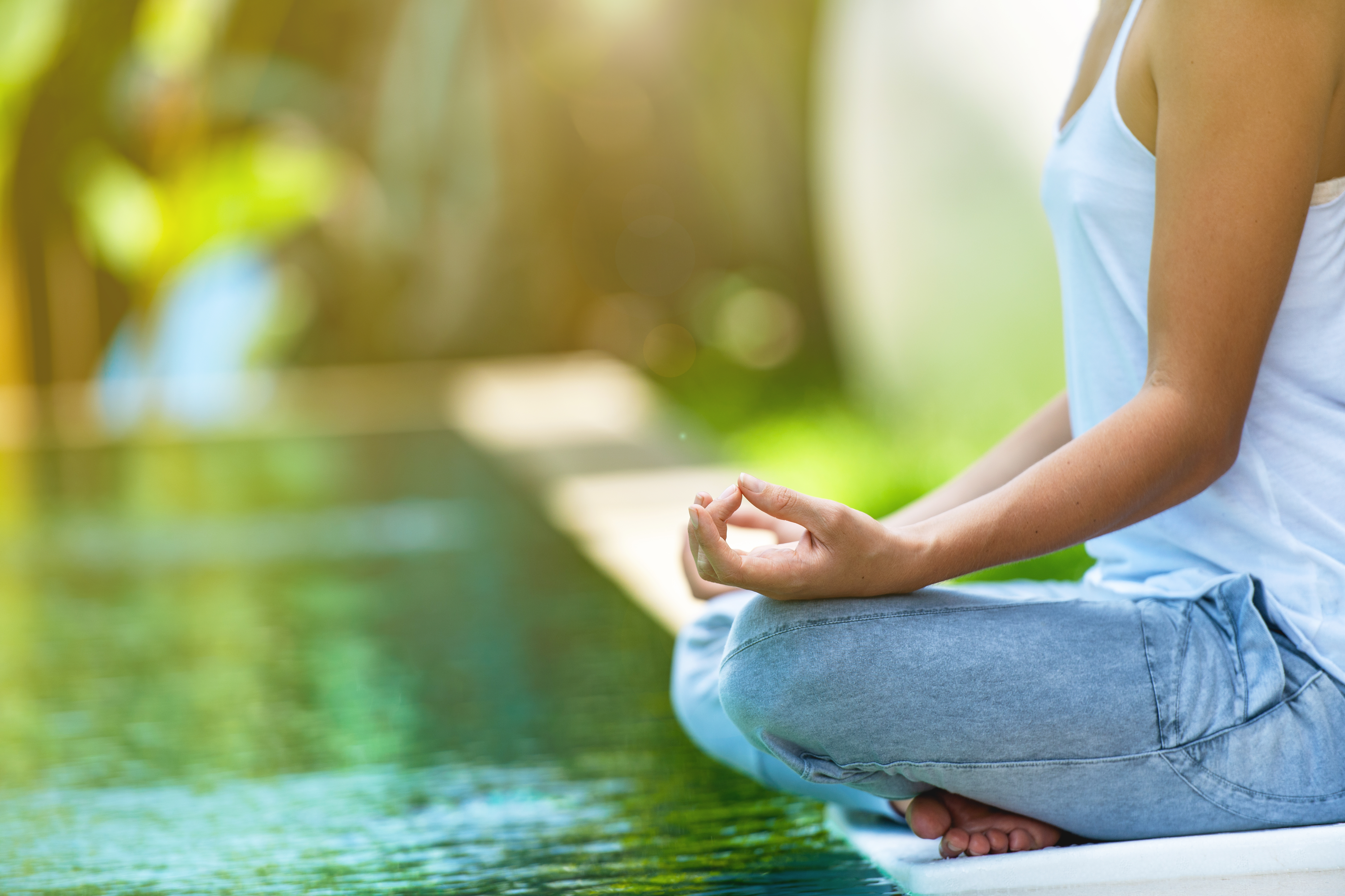 Yoga meditation by the pool Yoga meditation by the pool