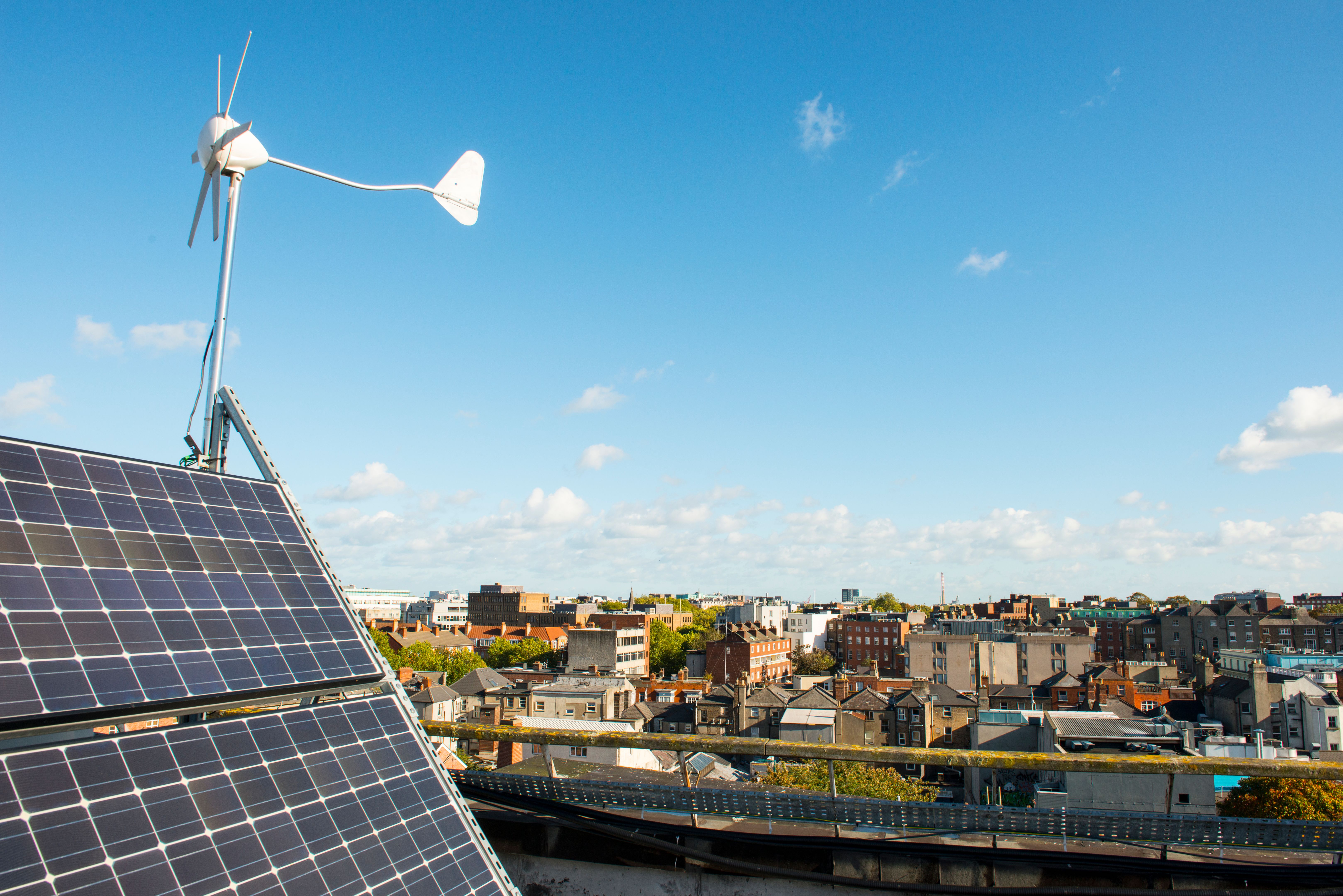 solar panel on roof with Dublin city in the background solar panel on roof with Dublin city in the background