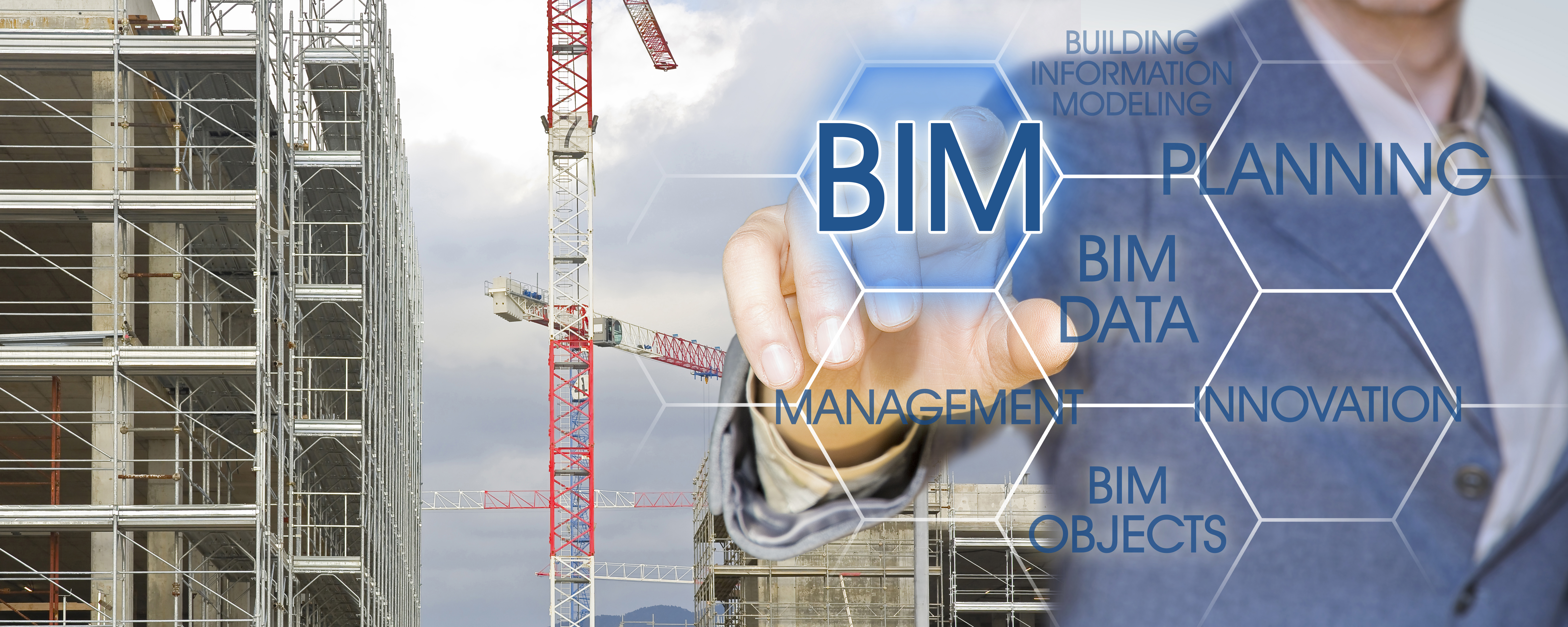 Building Information Modeling - BIM - A new way of architecture designing - Concept  with tower crane in a construction site