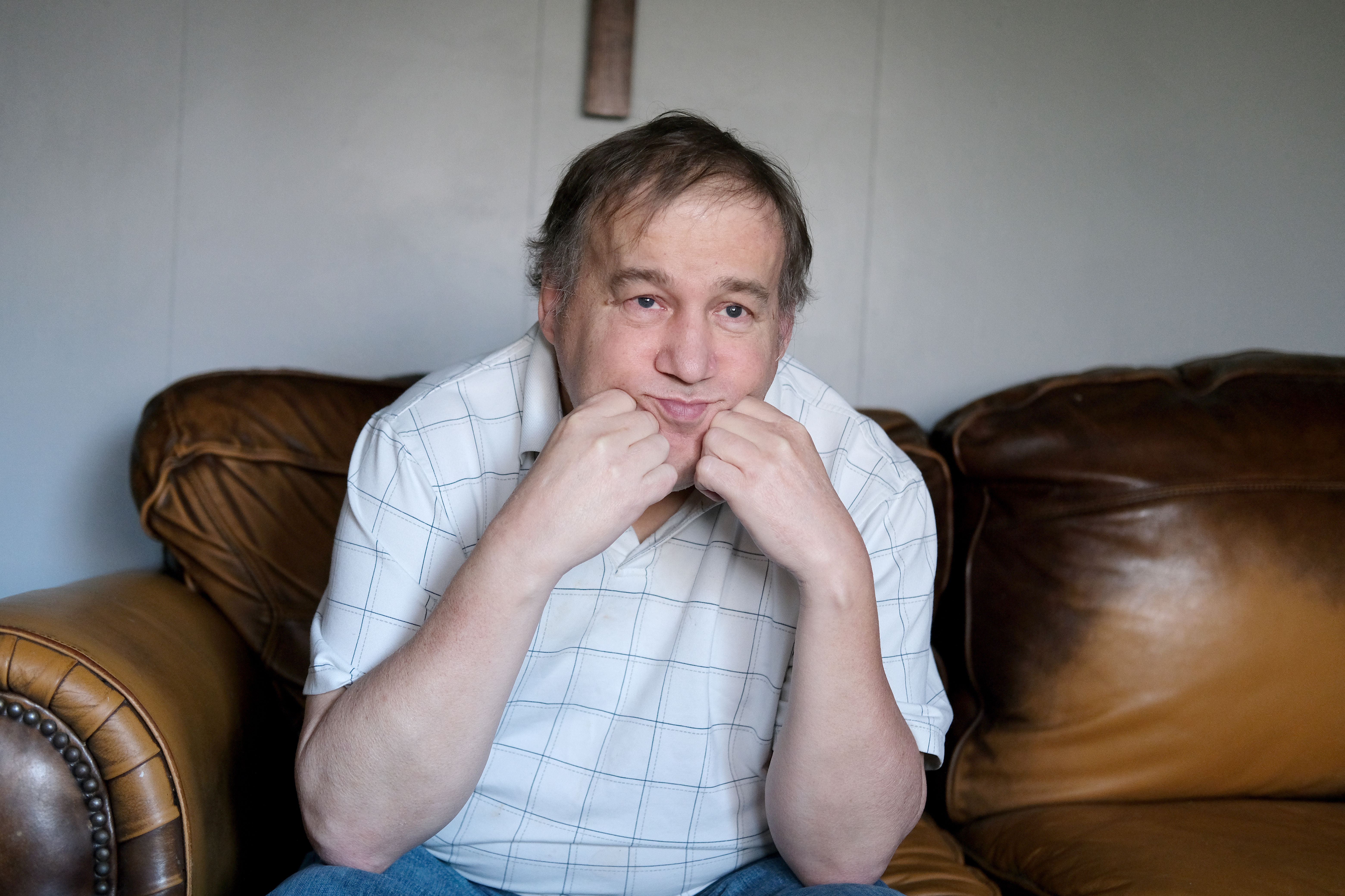 Adult autistic male with worried expression