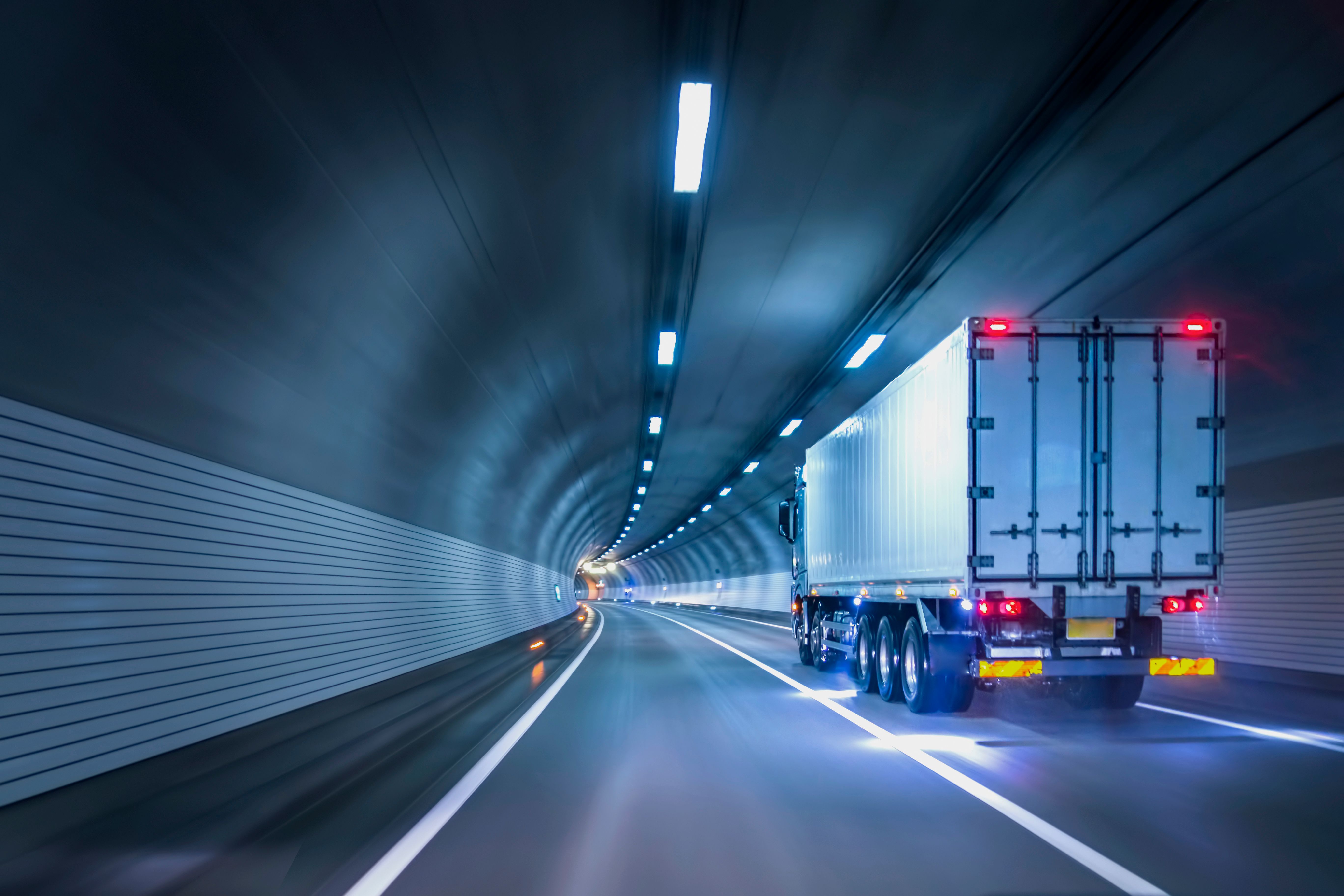 Trucks passing through tunnels