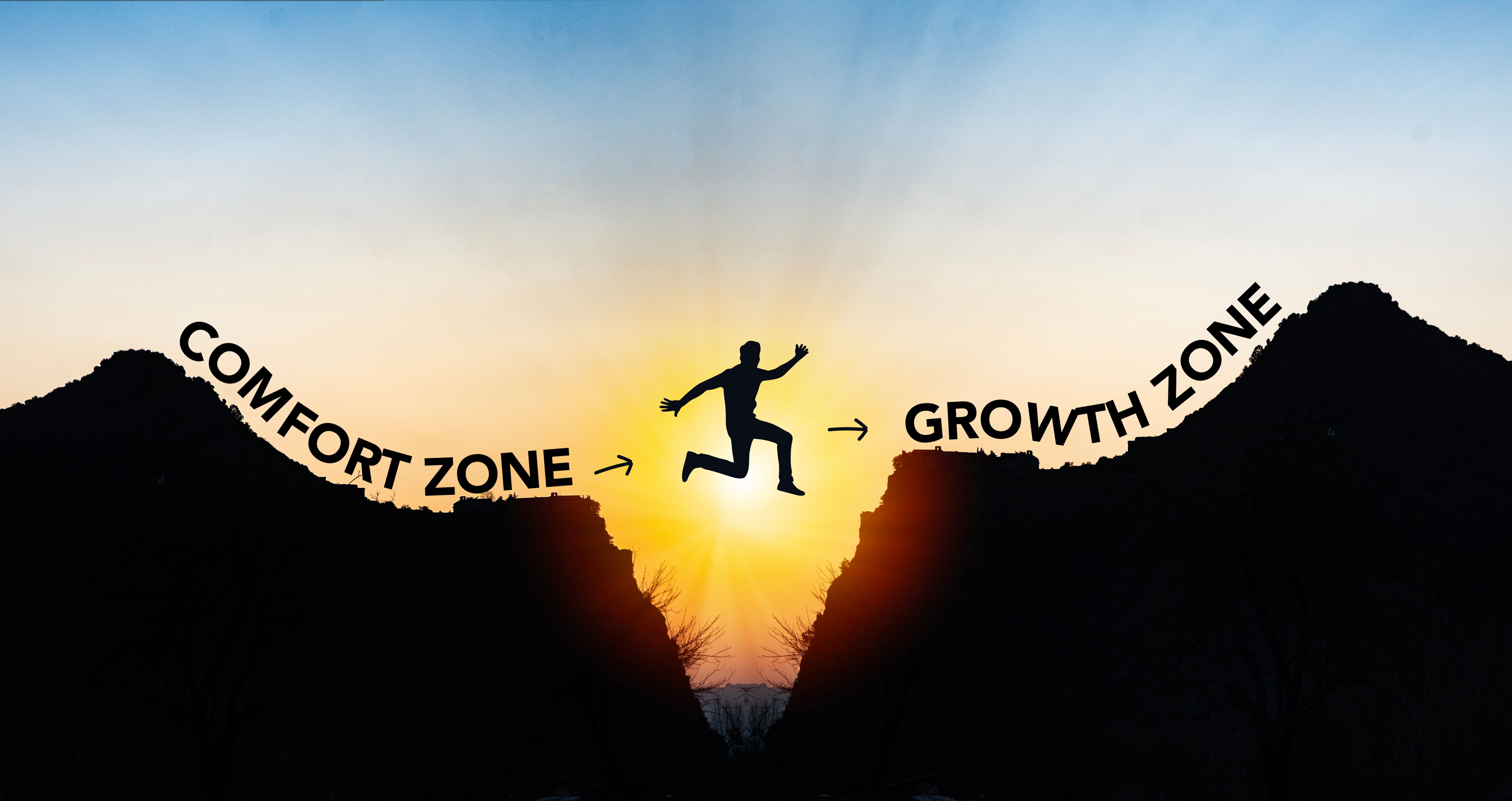 A person demonstrating courage by jumping over a chasm from a comfort zone to a growth and success growth zone.