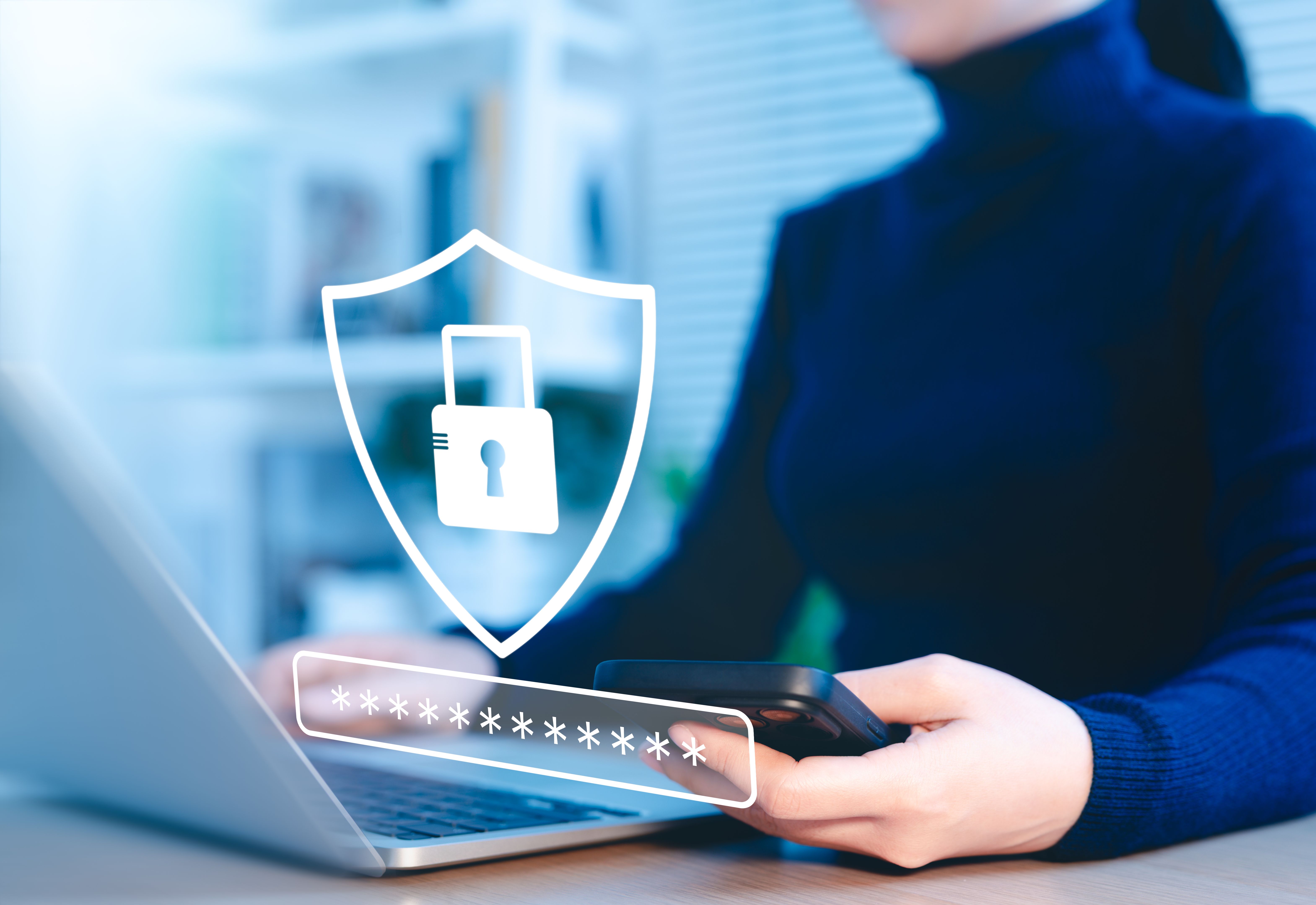 Cybersecurity concept. Lock icon and password input. Woman using laptop with shield icon representing cyber security, online security measures, password protection, data privacy, scam, Internet fraud, Cybersecurity concept. Lock icon and password input. Woman using laptop with shield icon representing cyber security, online security measures, password protection, data privacy, scam, Internet fraud,