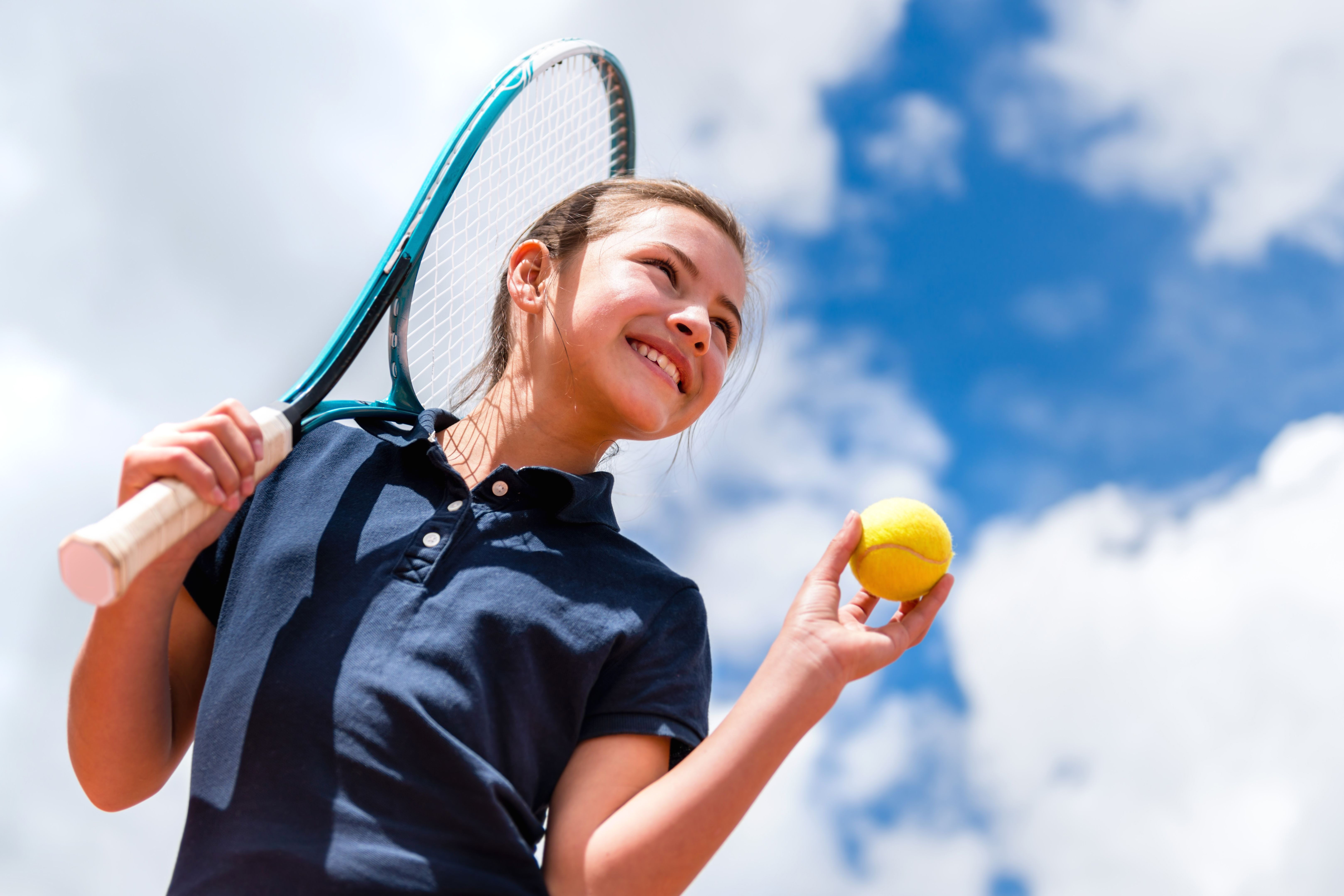 children playing tennis