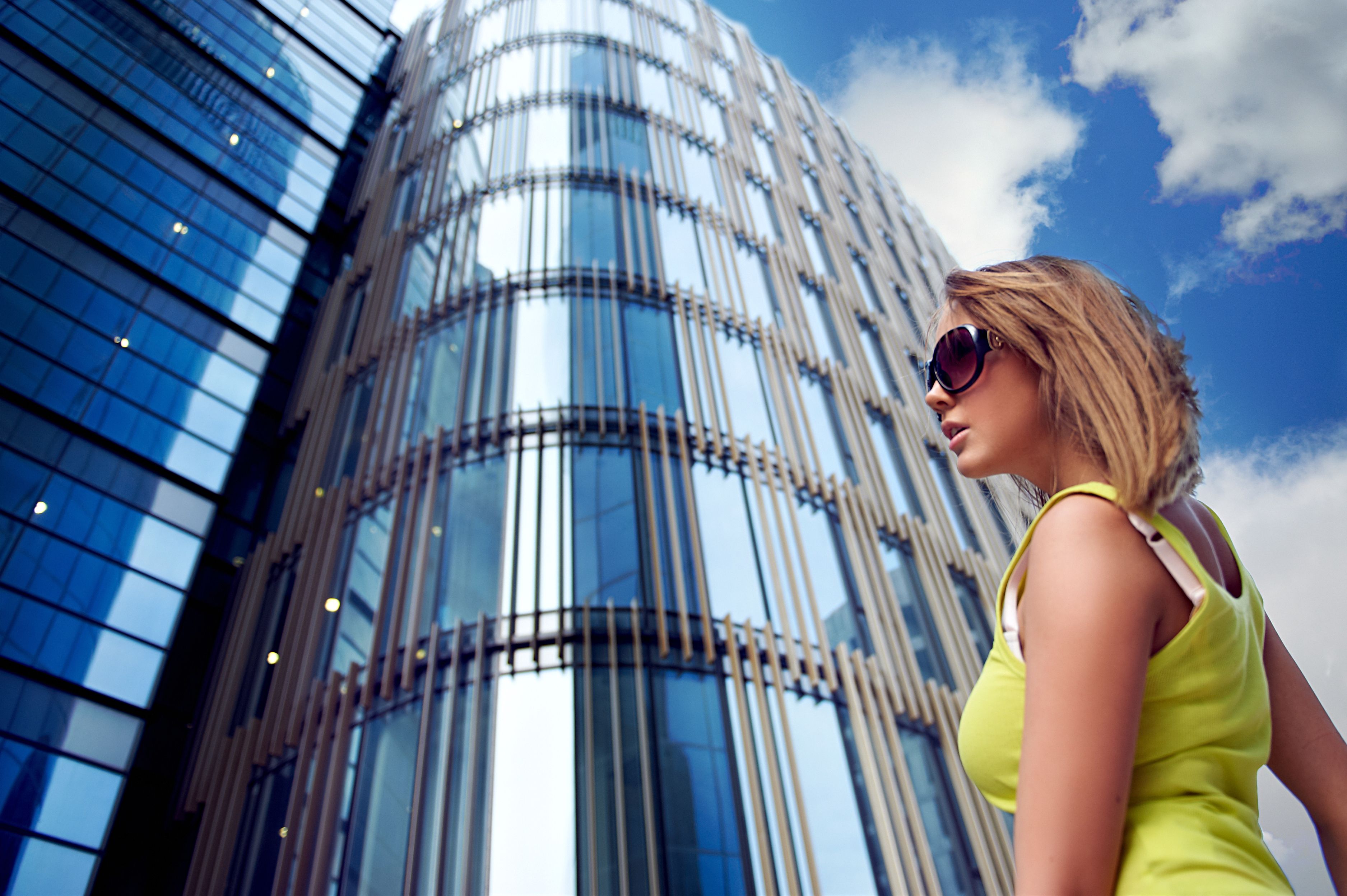Young woman near office building Young woman near office building