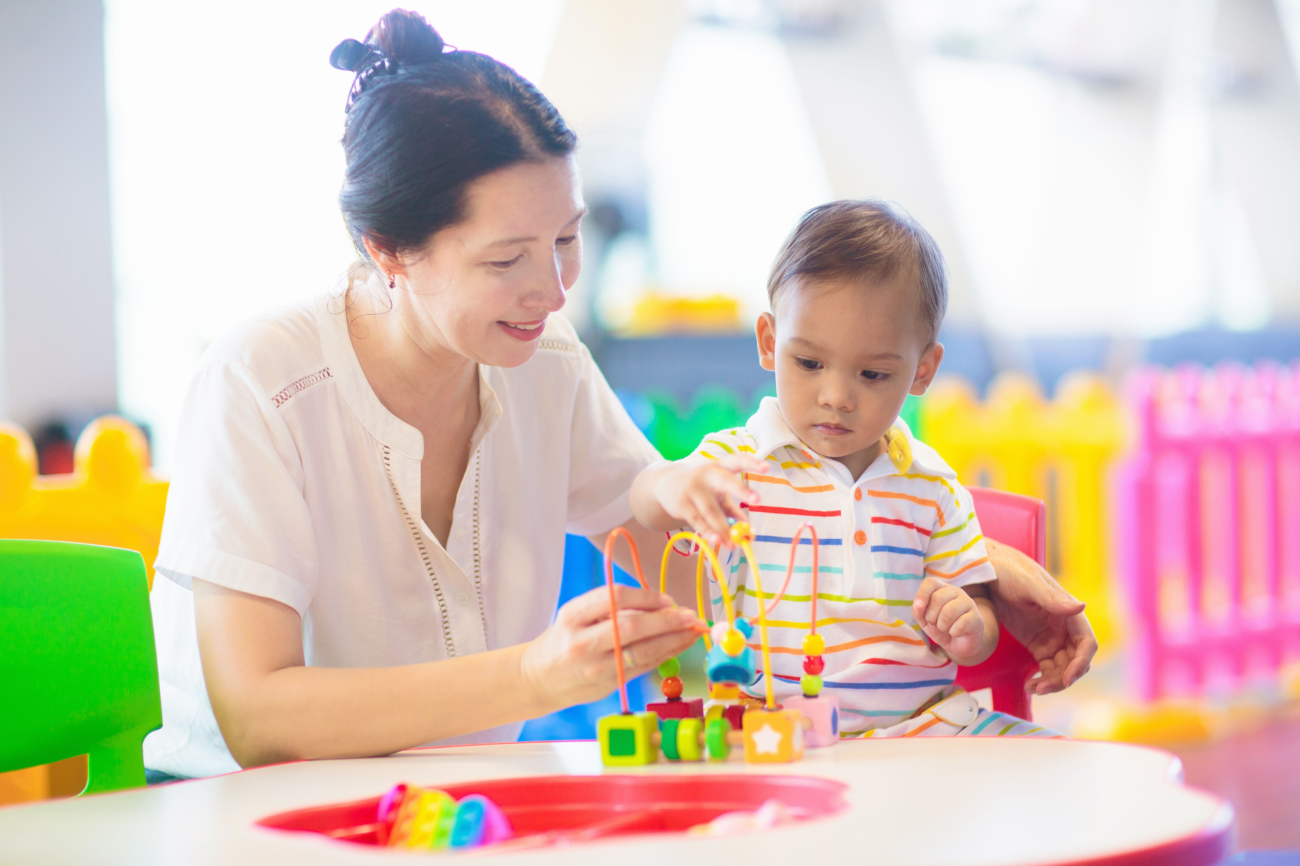 Cute baby boy in kindergarten or daycare. Cute baby boy in kindergarten or daycare.