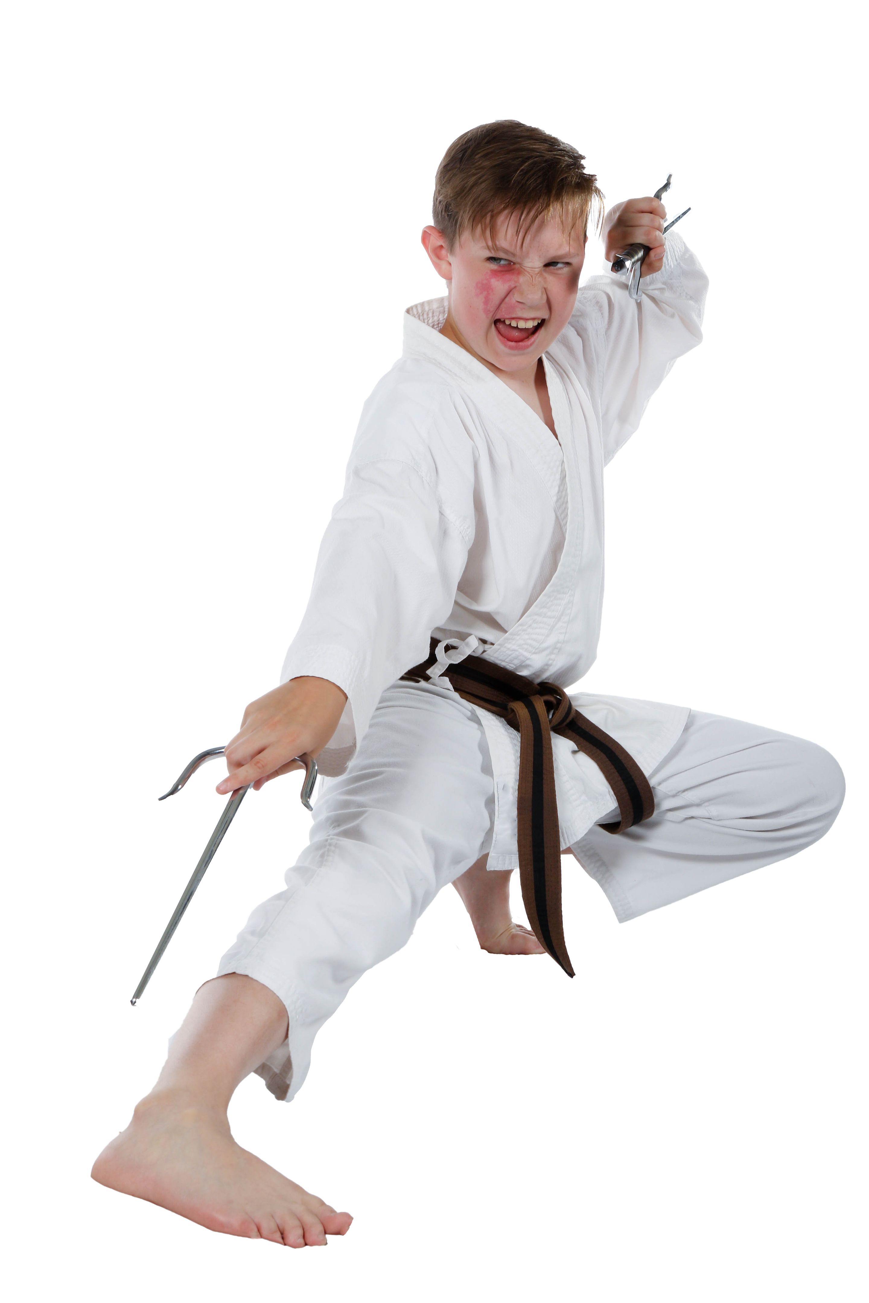 Teenage boy doing martial arts