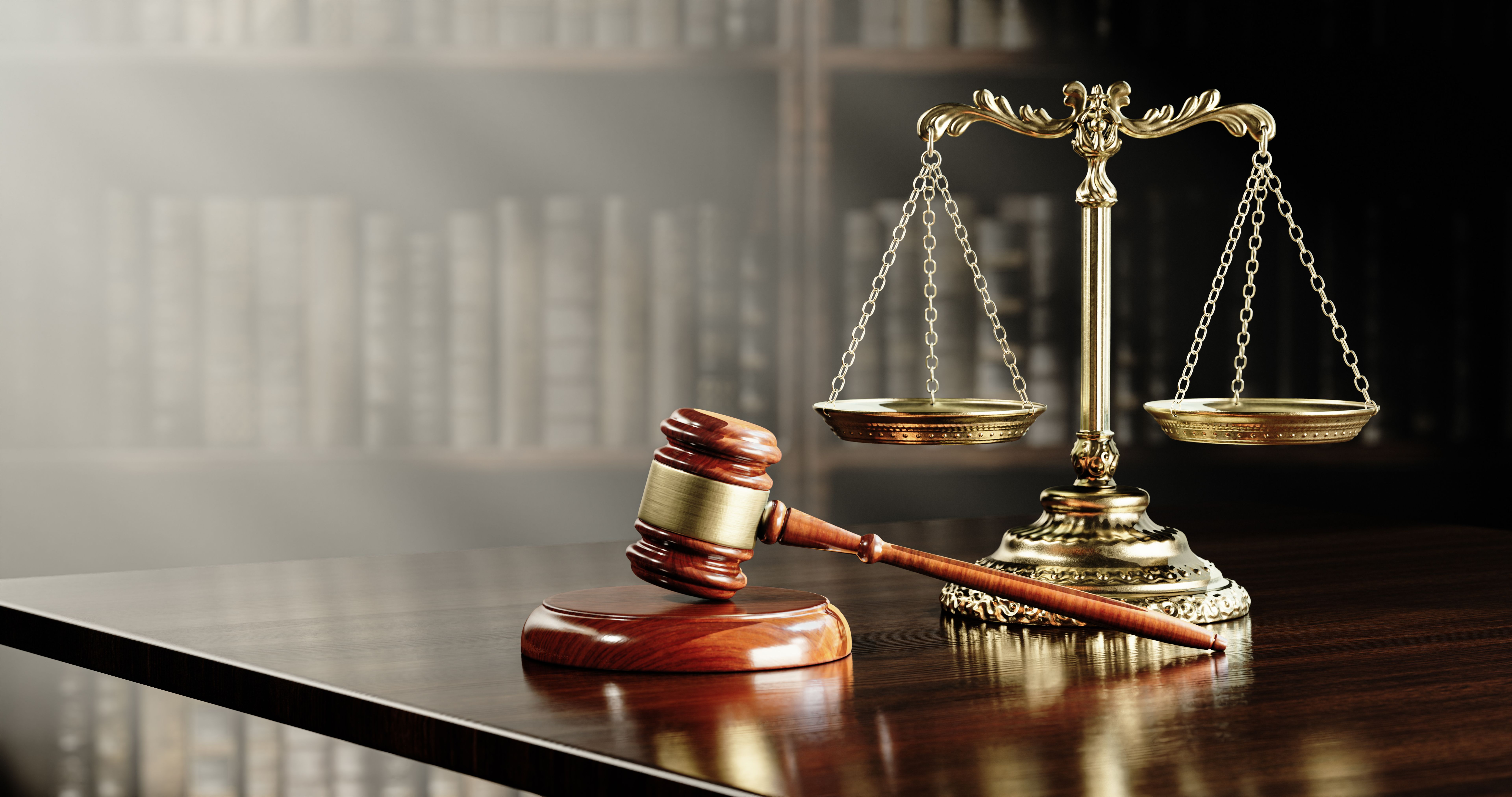 Legal concept: Scales of justice and and the judge's gavel hammer as a symbol of law and order