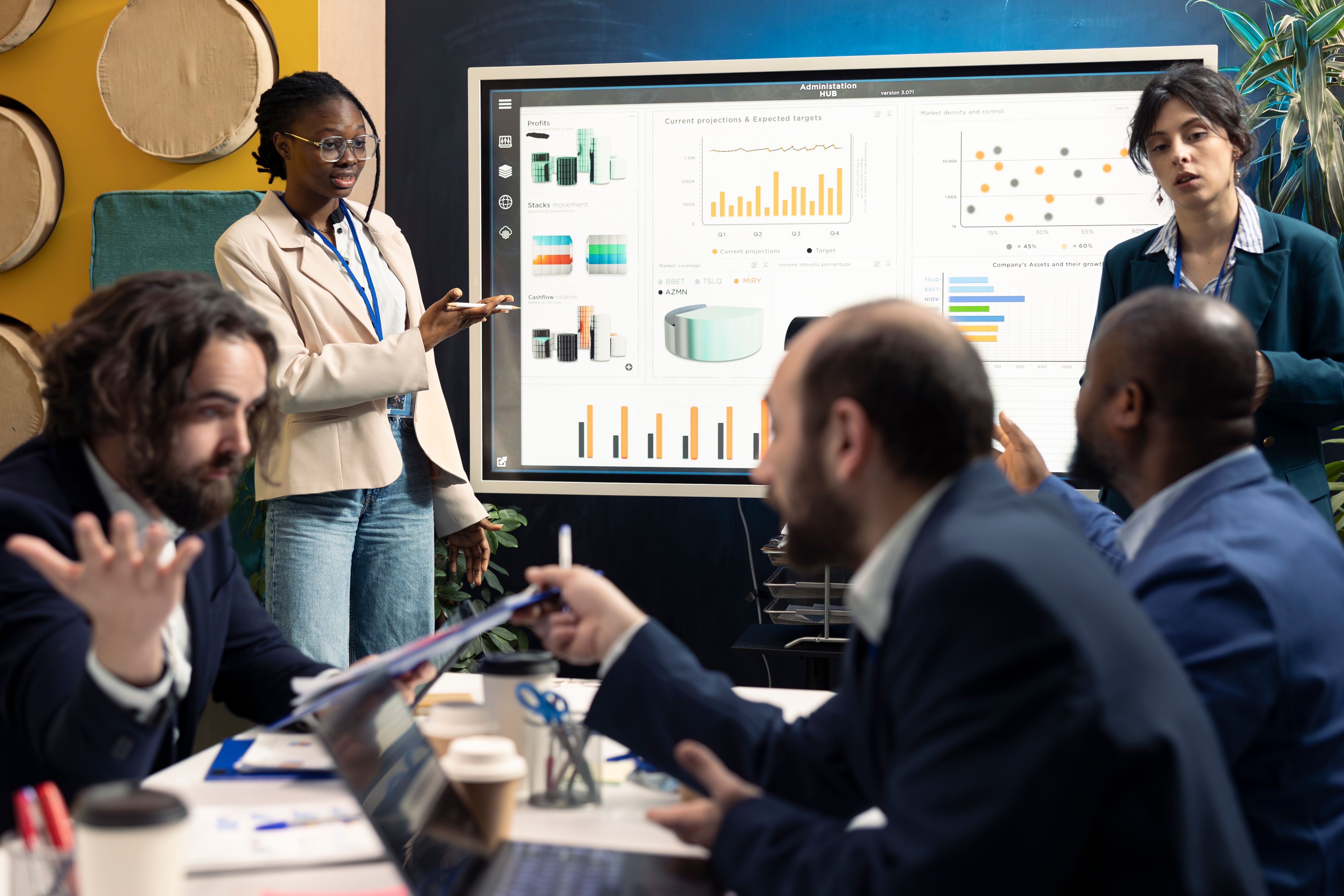 Team of enterprise workers preparing their pitch for the stakeholders meeting