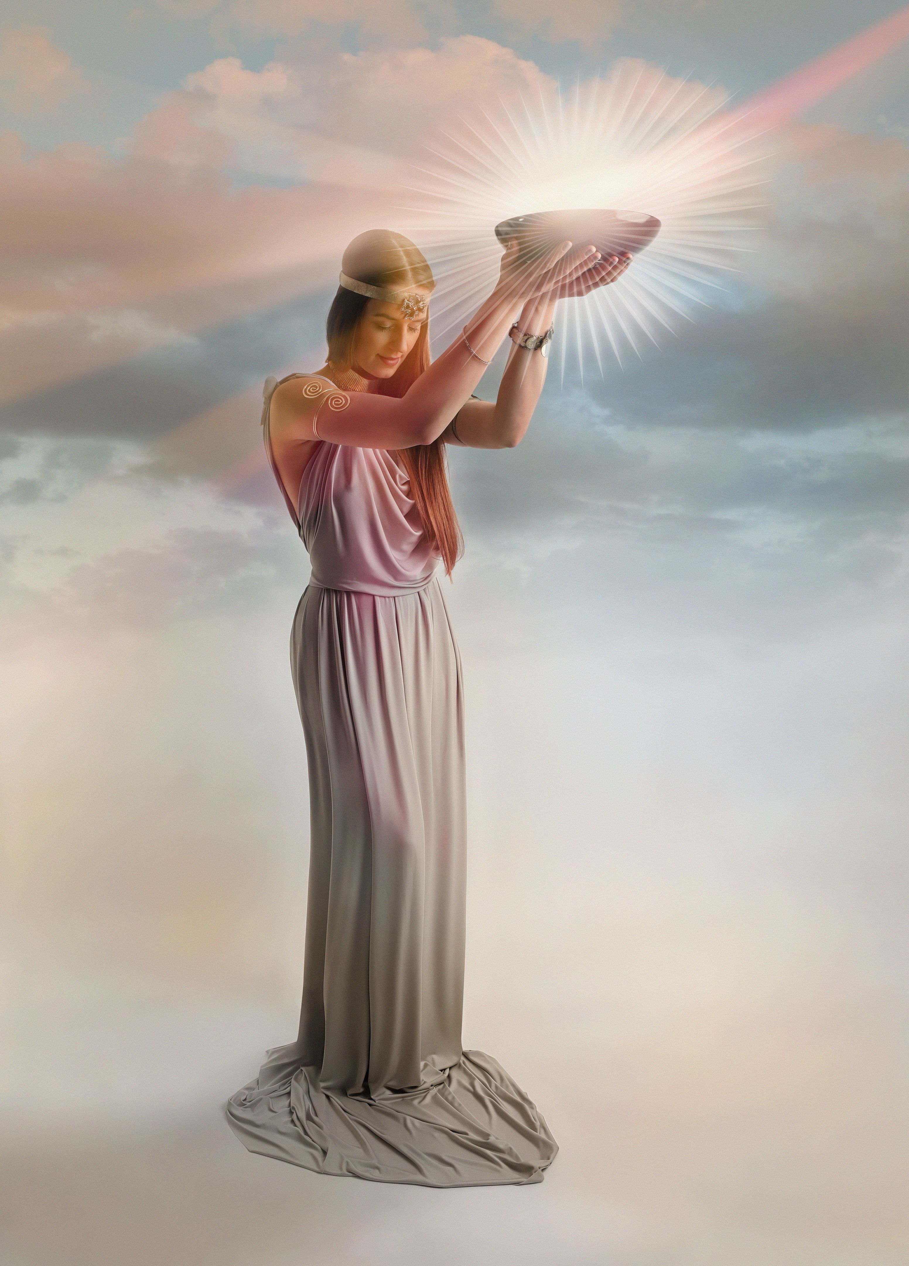 Multiple exposure of Goddess and glowing light