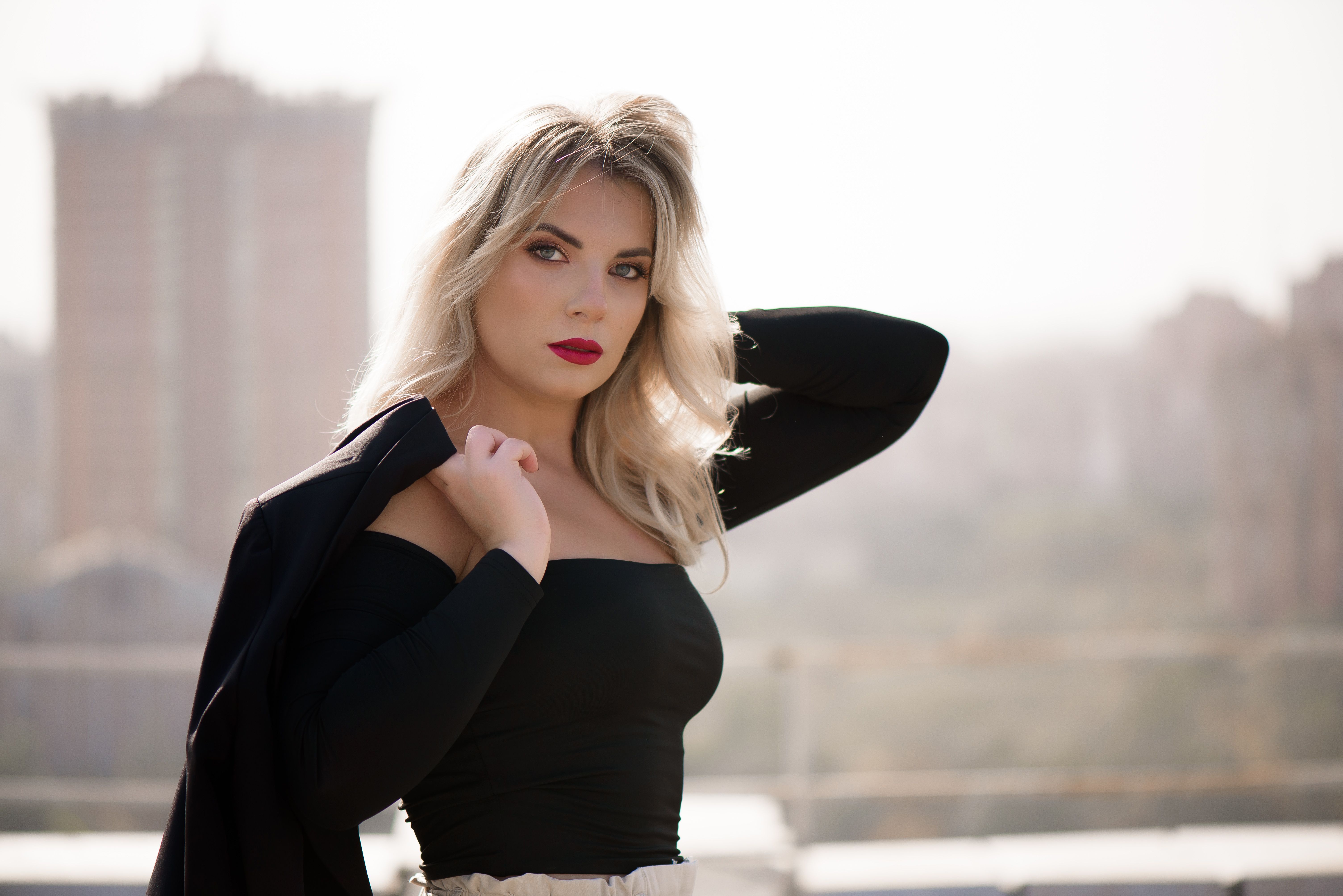 Portrait of a beautiful blonde on the roof top. Portrait of a beautiful blonde on the roof top.