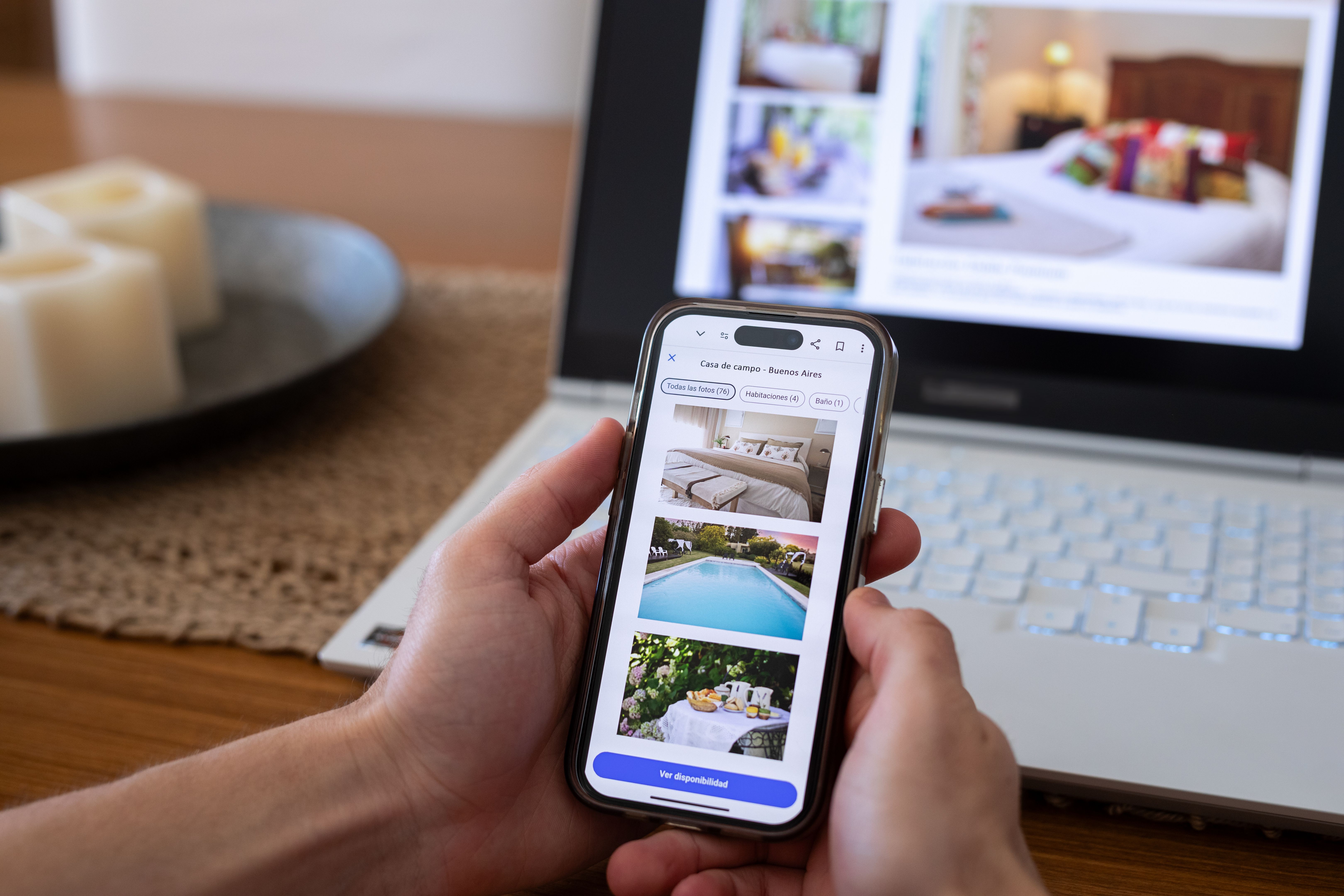 Unrecognizable person reviewing hotels online, using smartphone Unrecognizable person reviewing hotels online, using smartphone