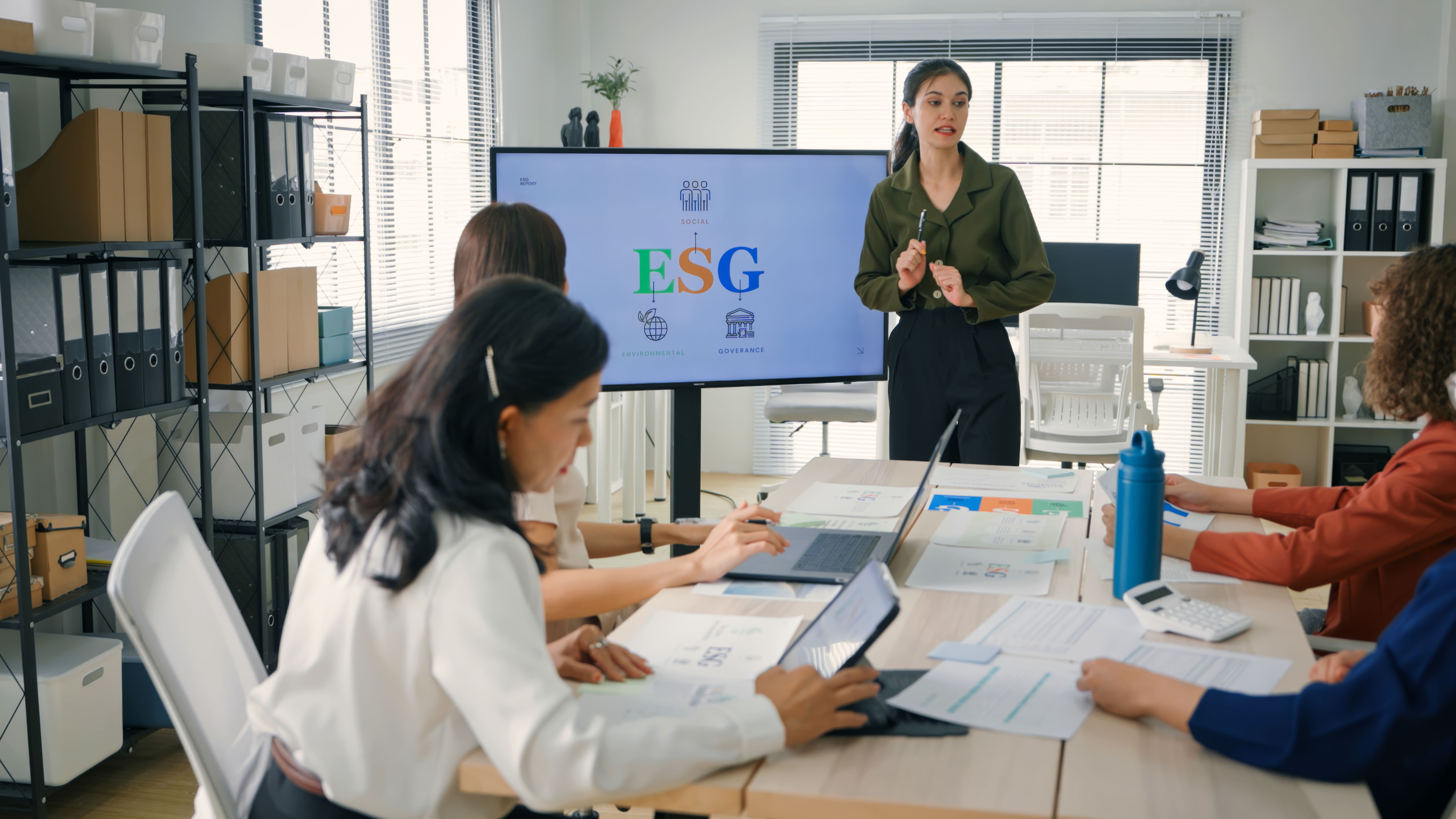 ESG Presentation in Modern Workspace. Group of female Business meeting in the office ESG Presentation in Modern Workspace. Group of female Business meeting in the office