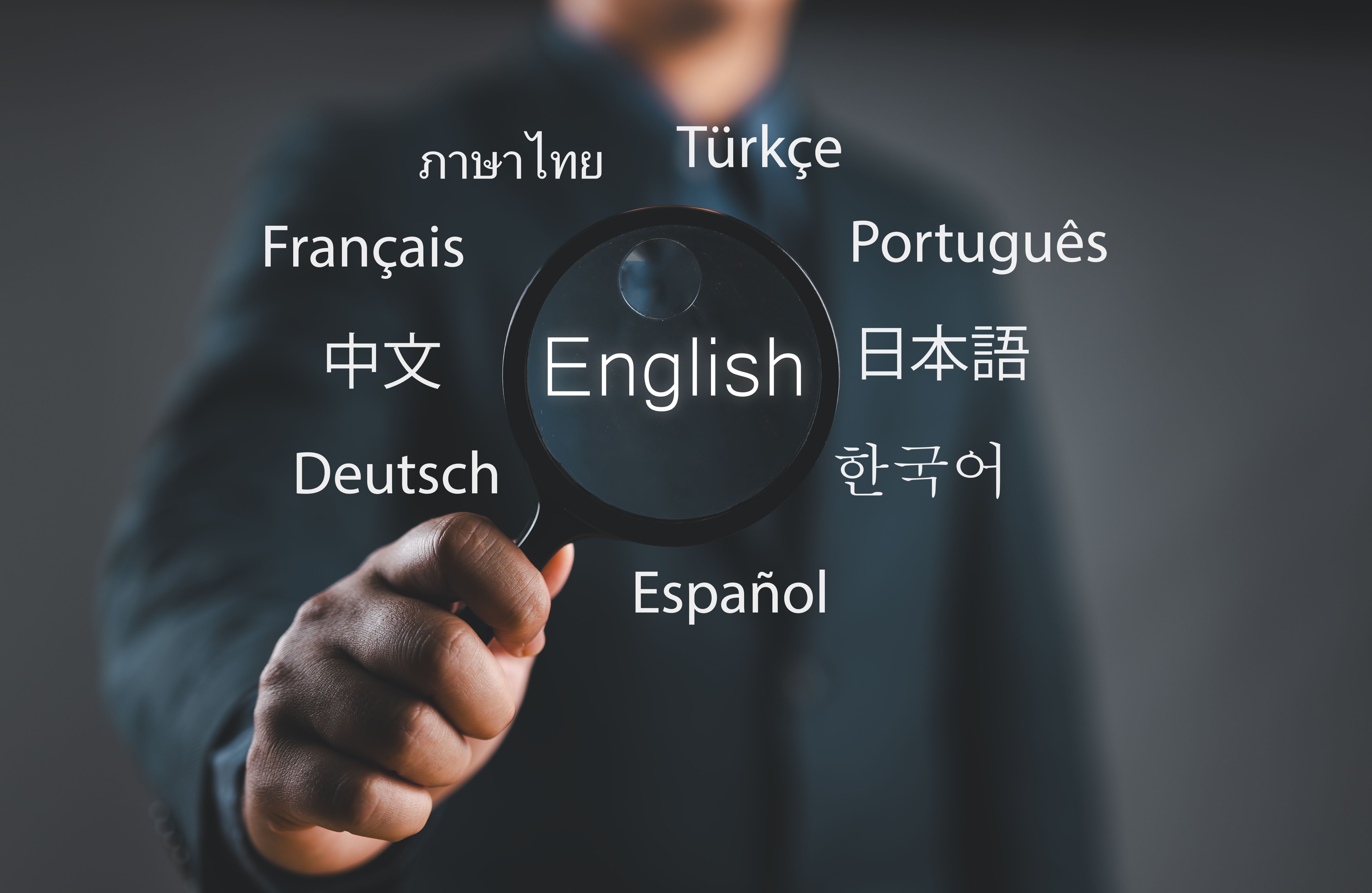 Magnifier focus to English language translation or translate on worldwide language conversation speaking concept.