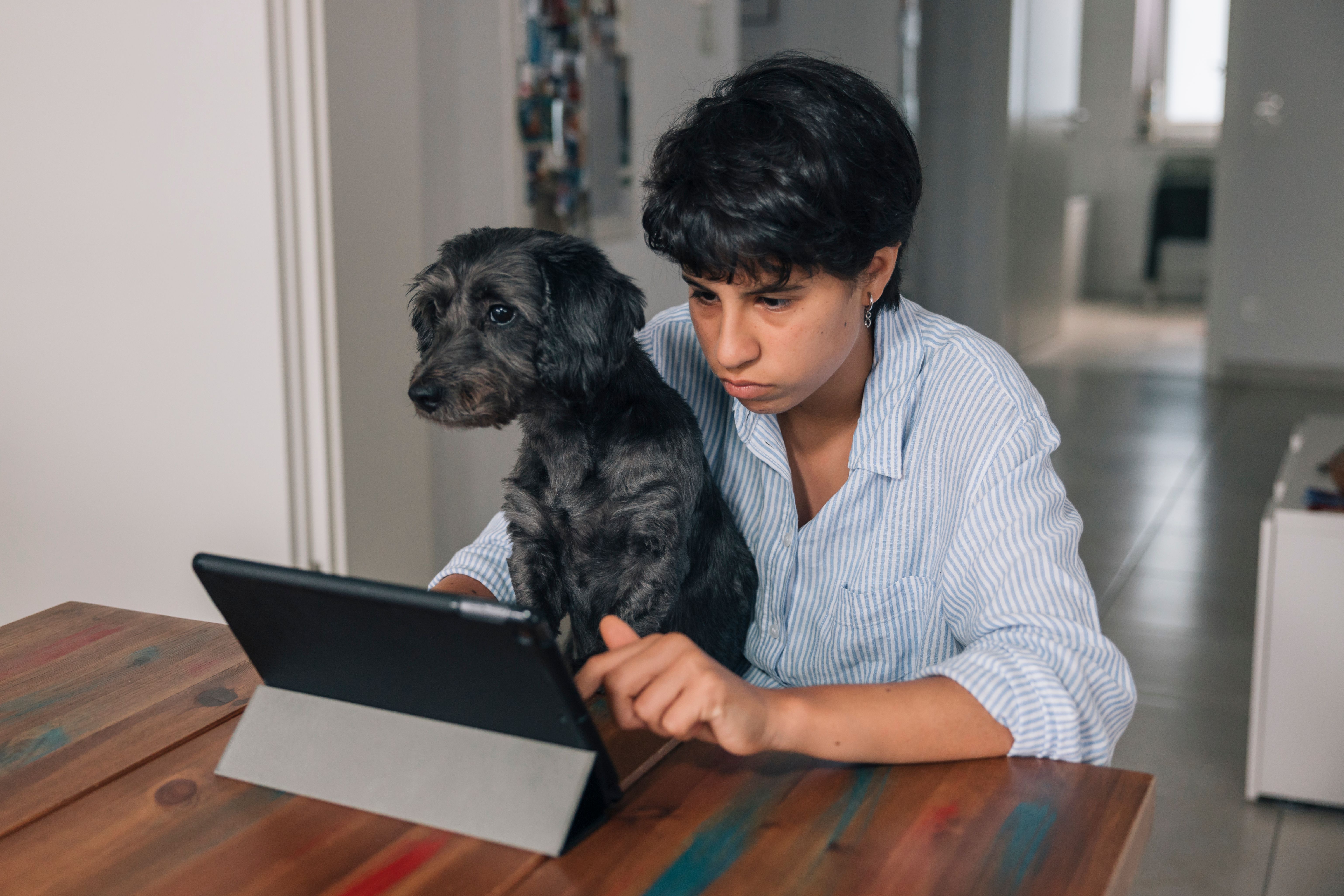 teen solving problem with pet