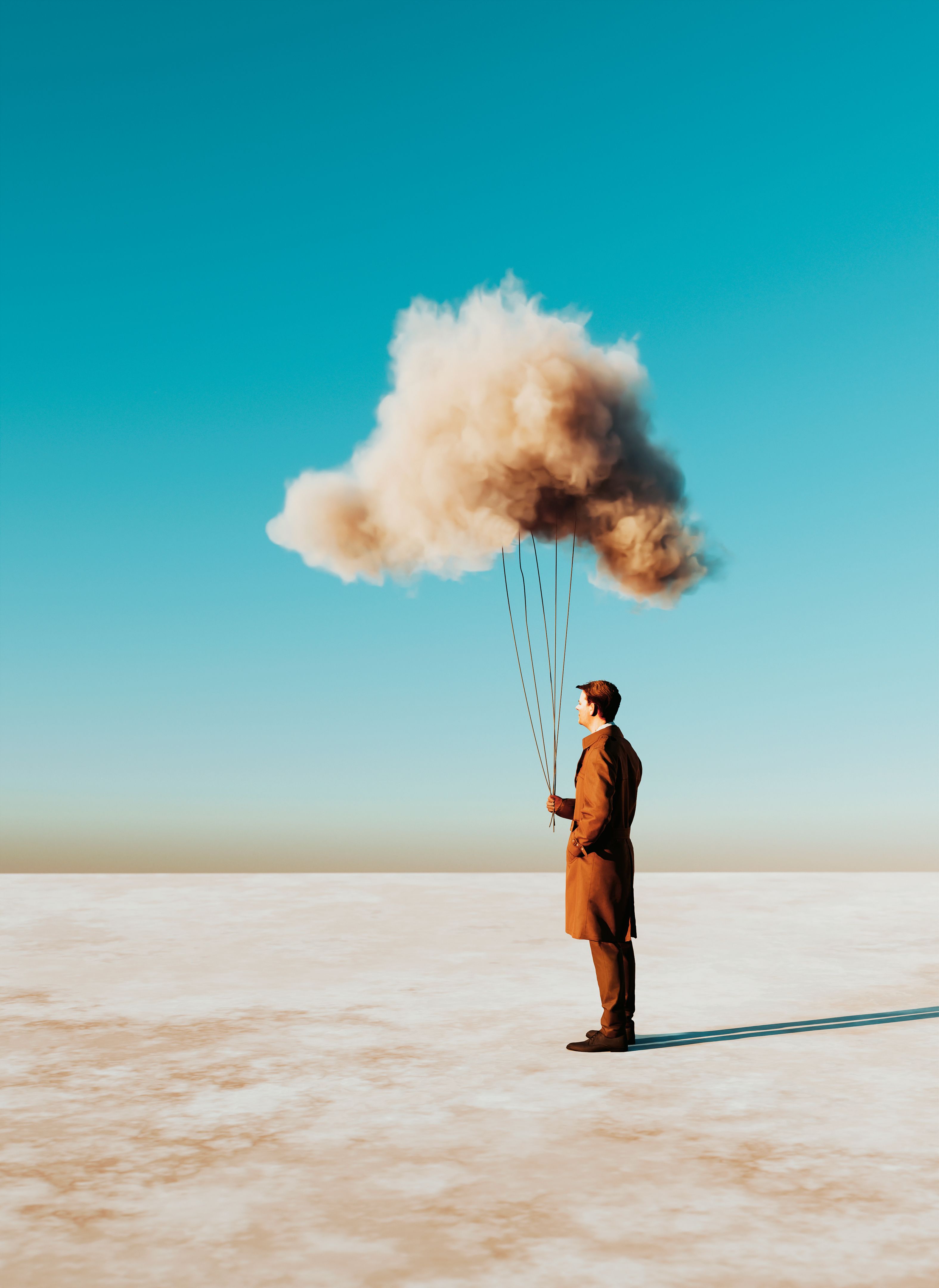 Man holds on to a cloud like it was a balloon