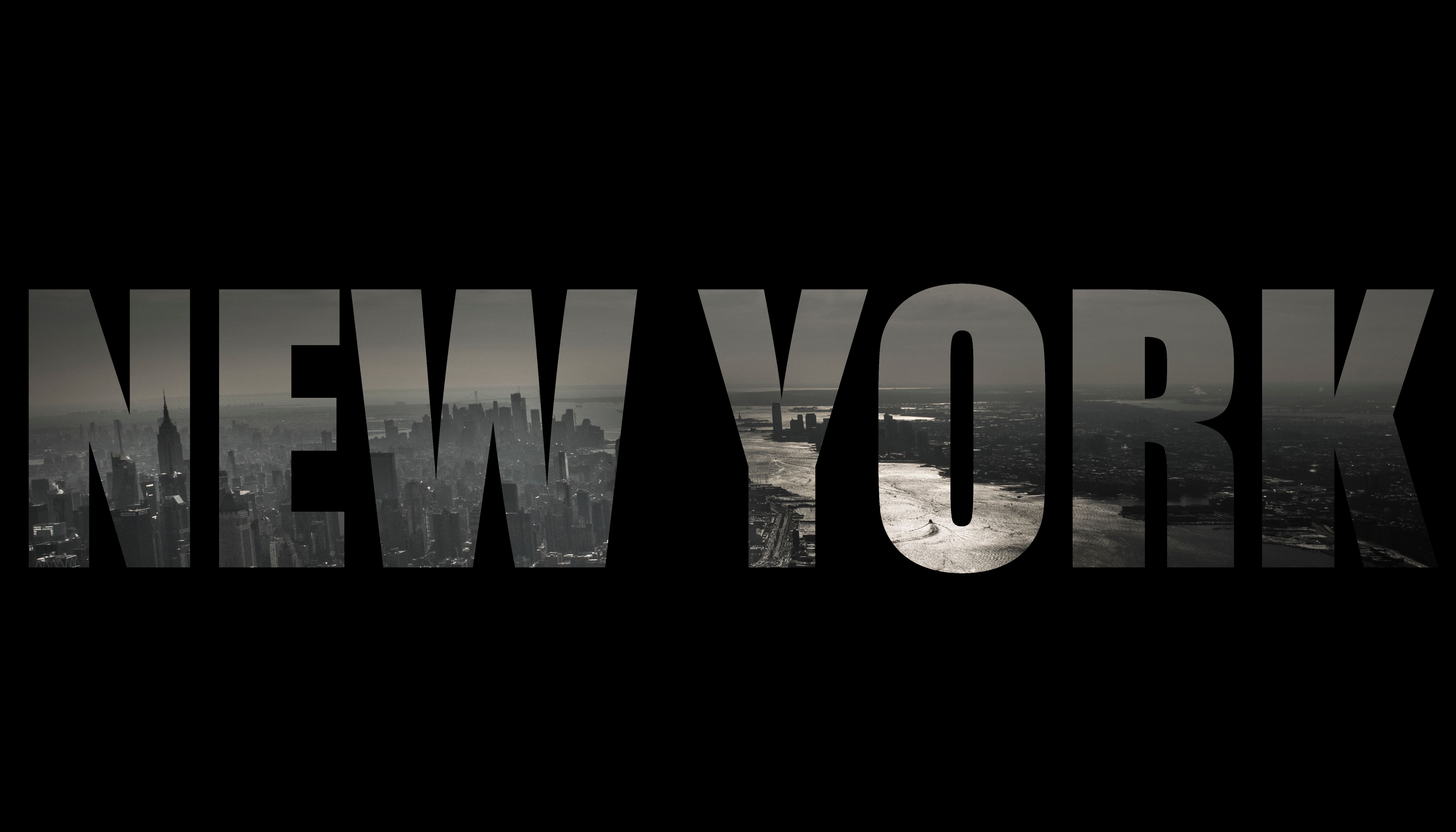 New York City text with urban skyline