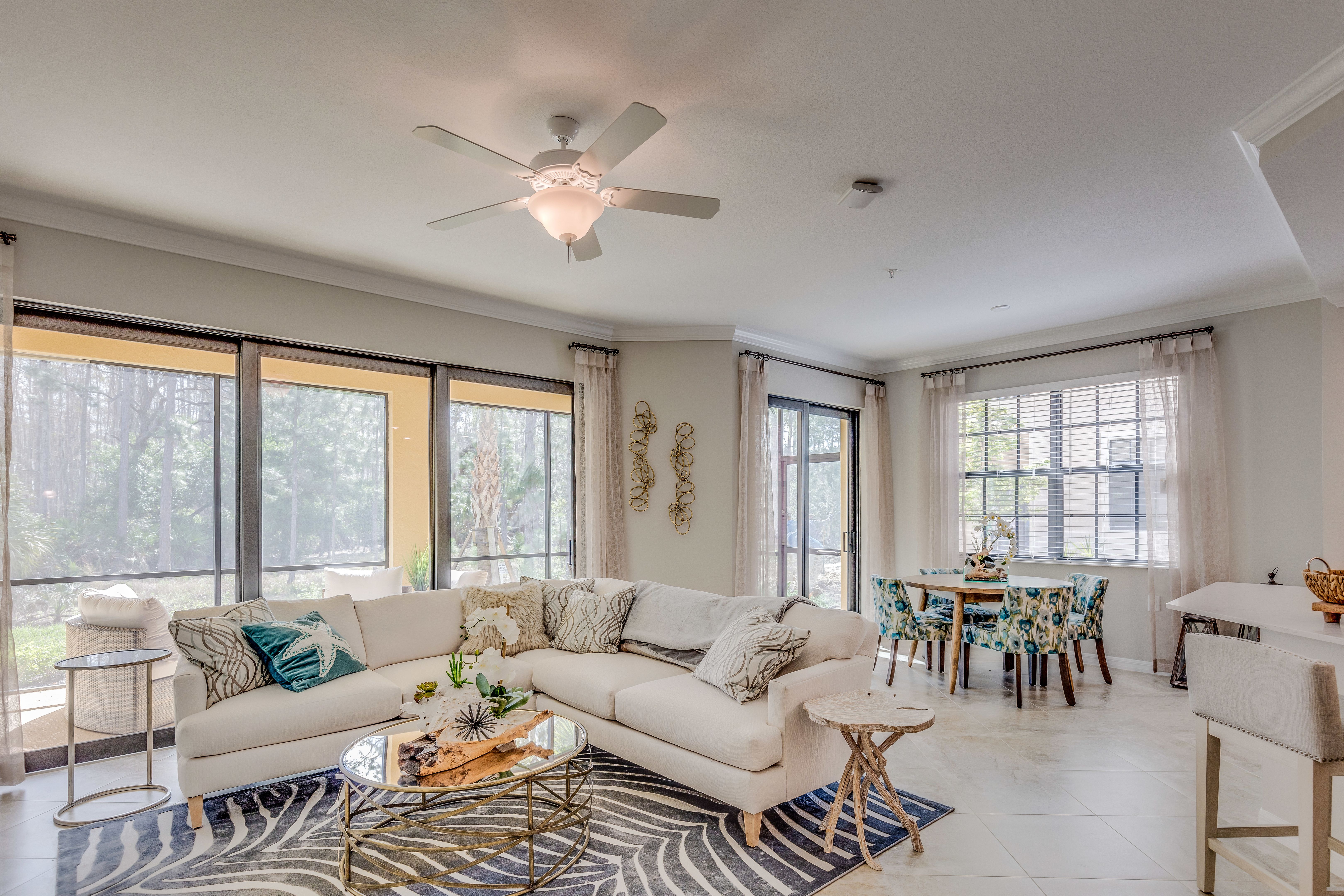 Open floorplan with view of sunroom from family room