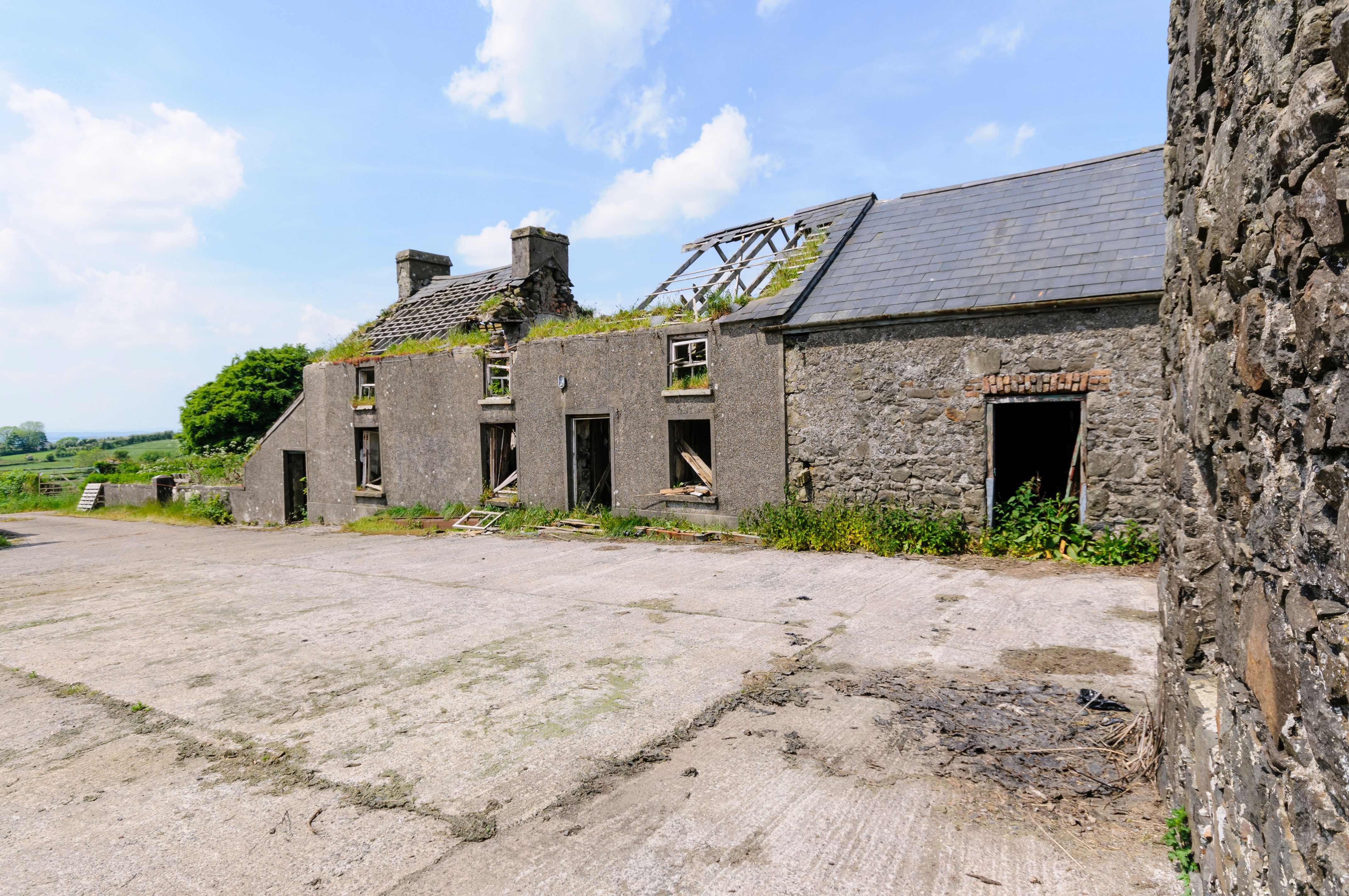 Derelict farmhouse and farm yard