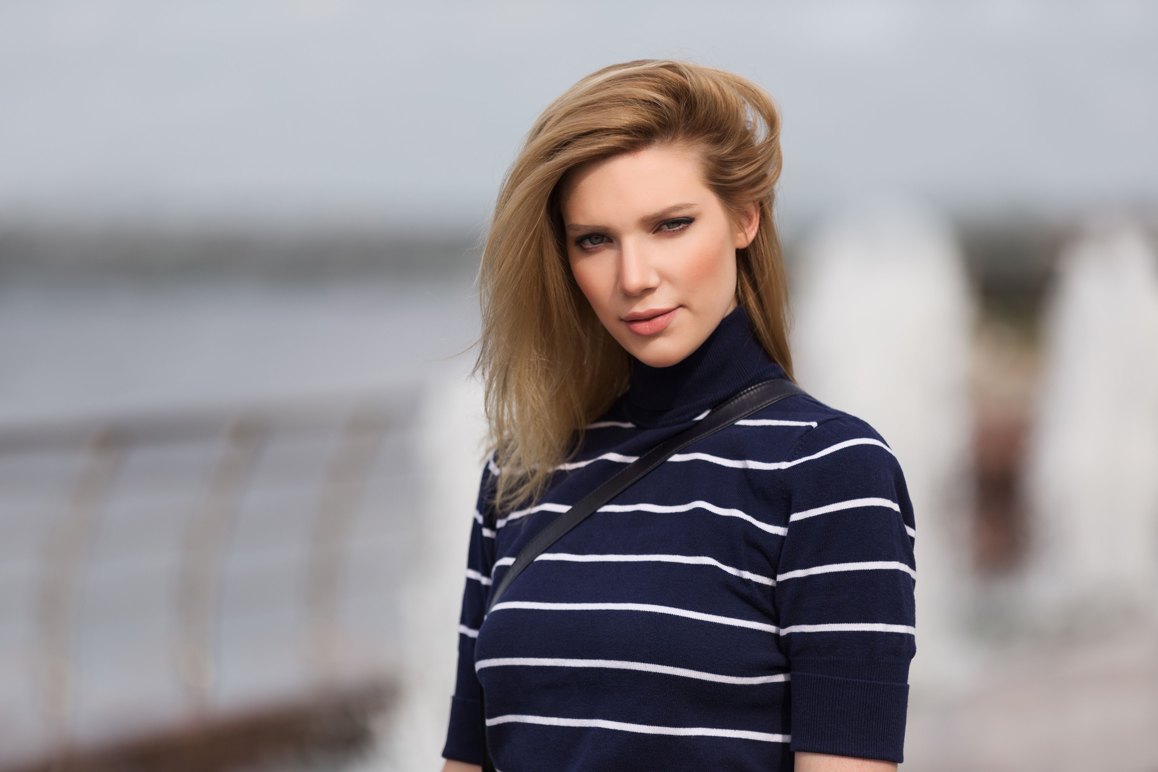 Young fashion woman in striped turtleneck t-shirt