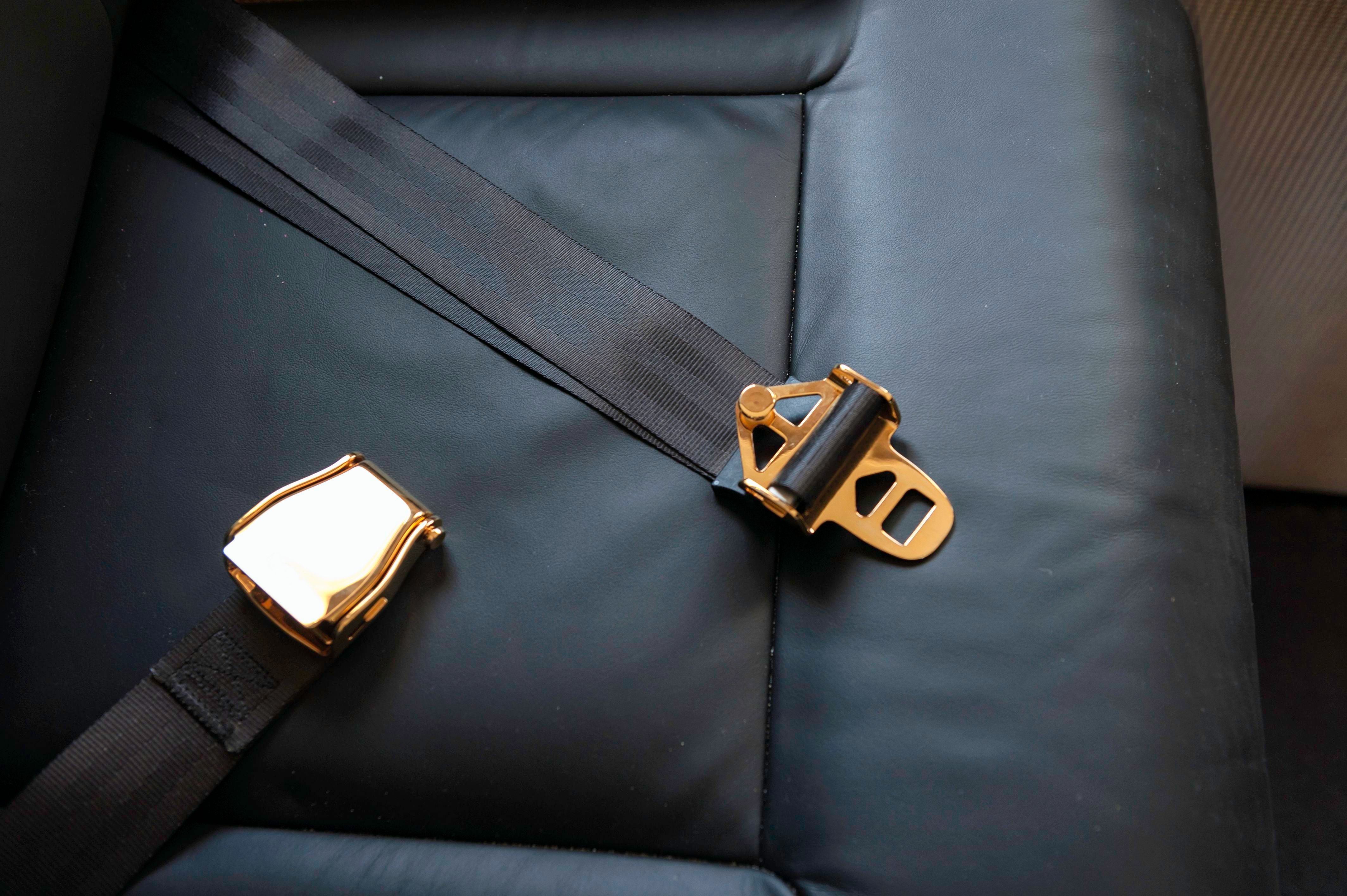 Airplane first class seat belt