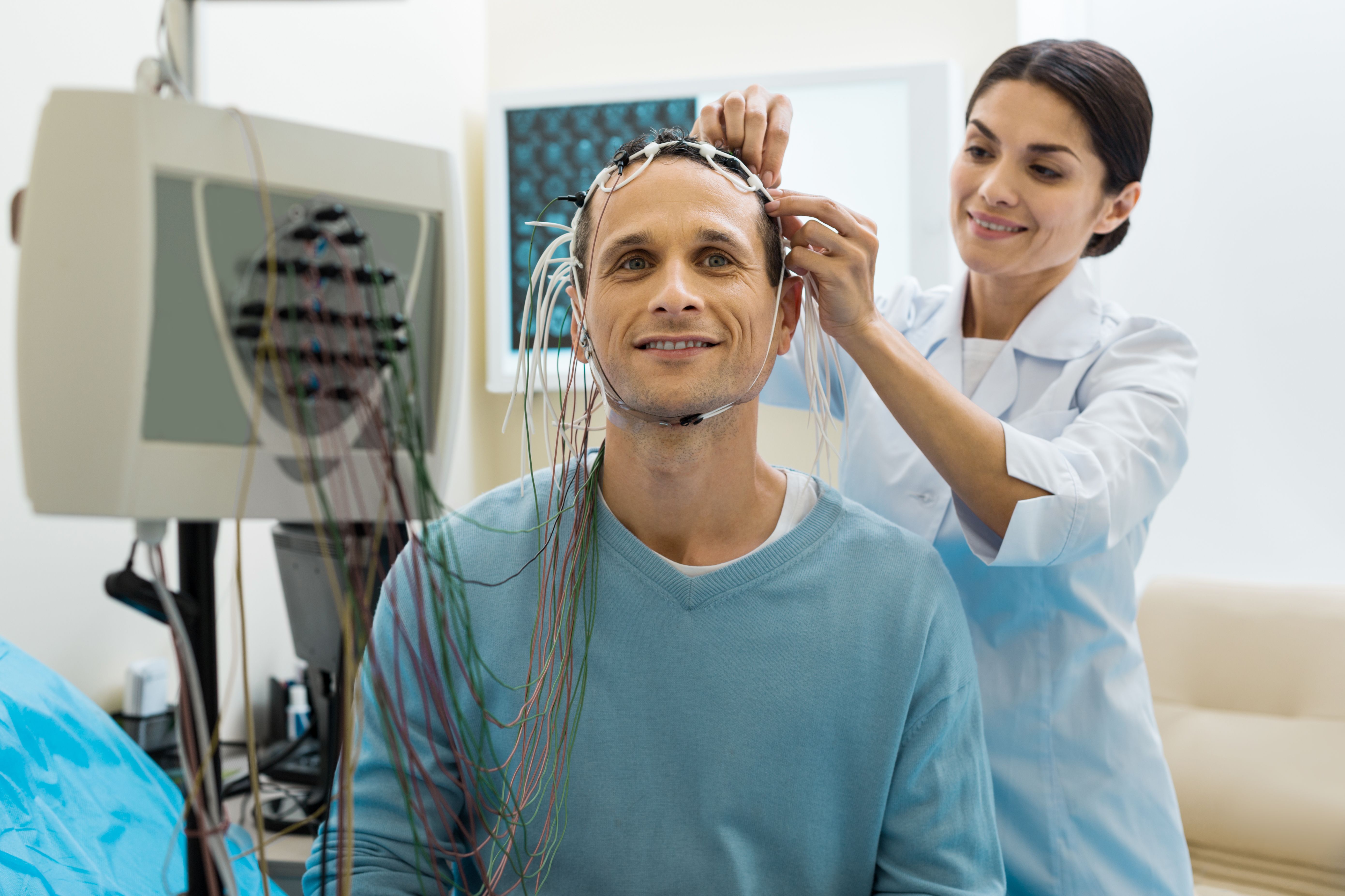 technician applying eeg