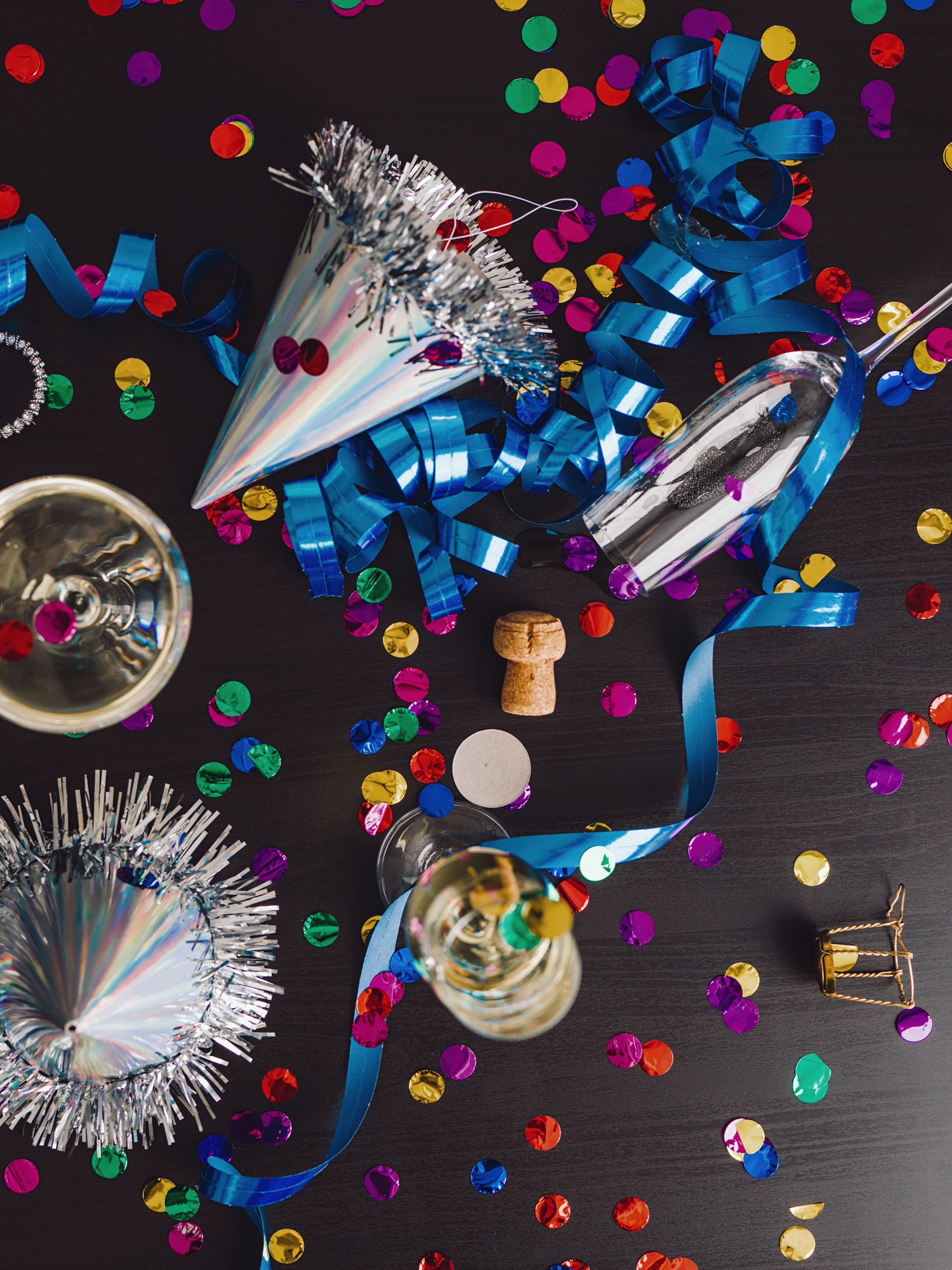 Messy New years still life background party place setting Messy New years still life background party place setting