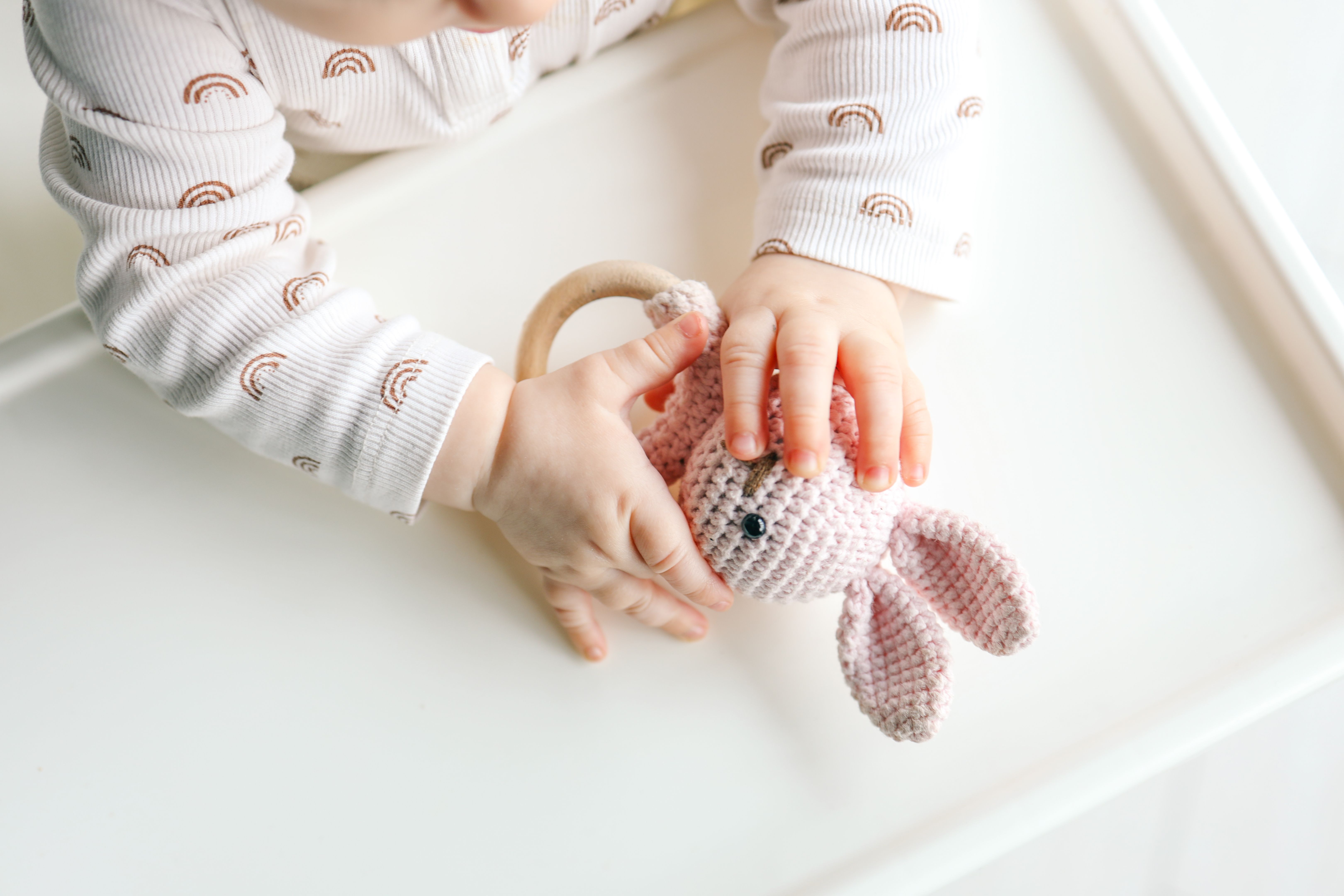 baby playing crochet