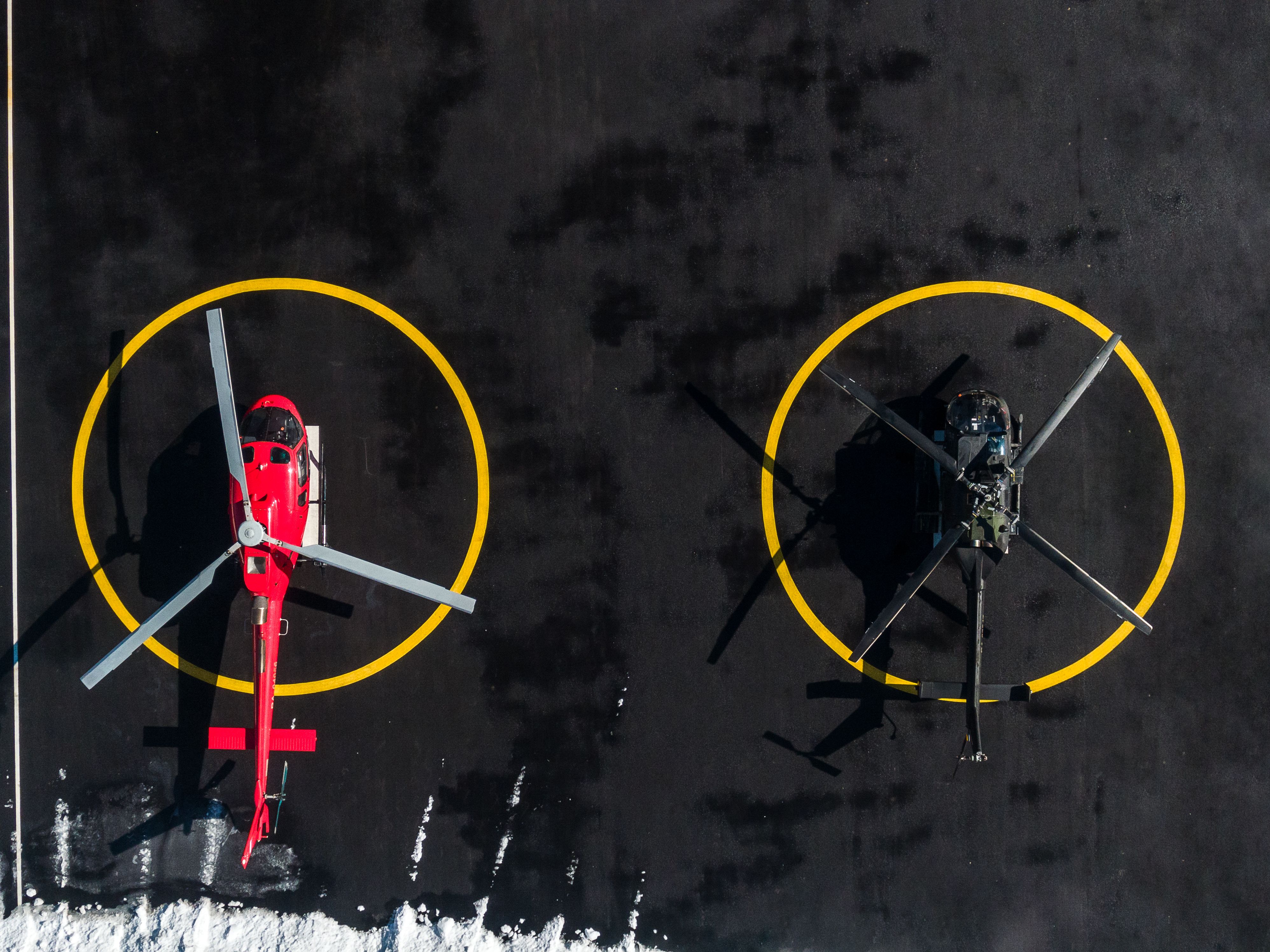 Two helicopters at helipad