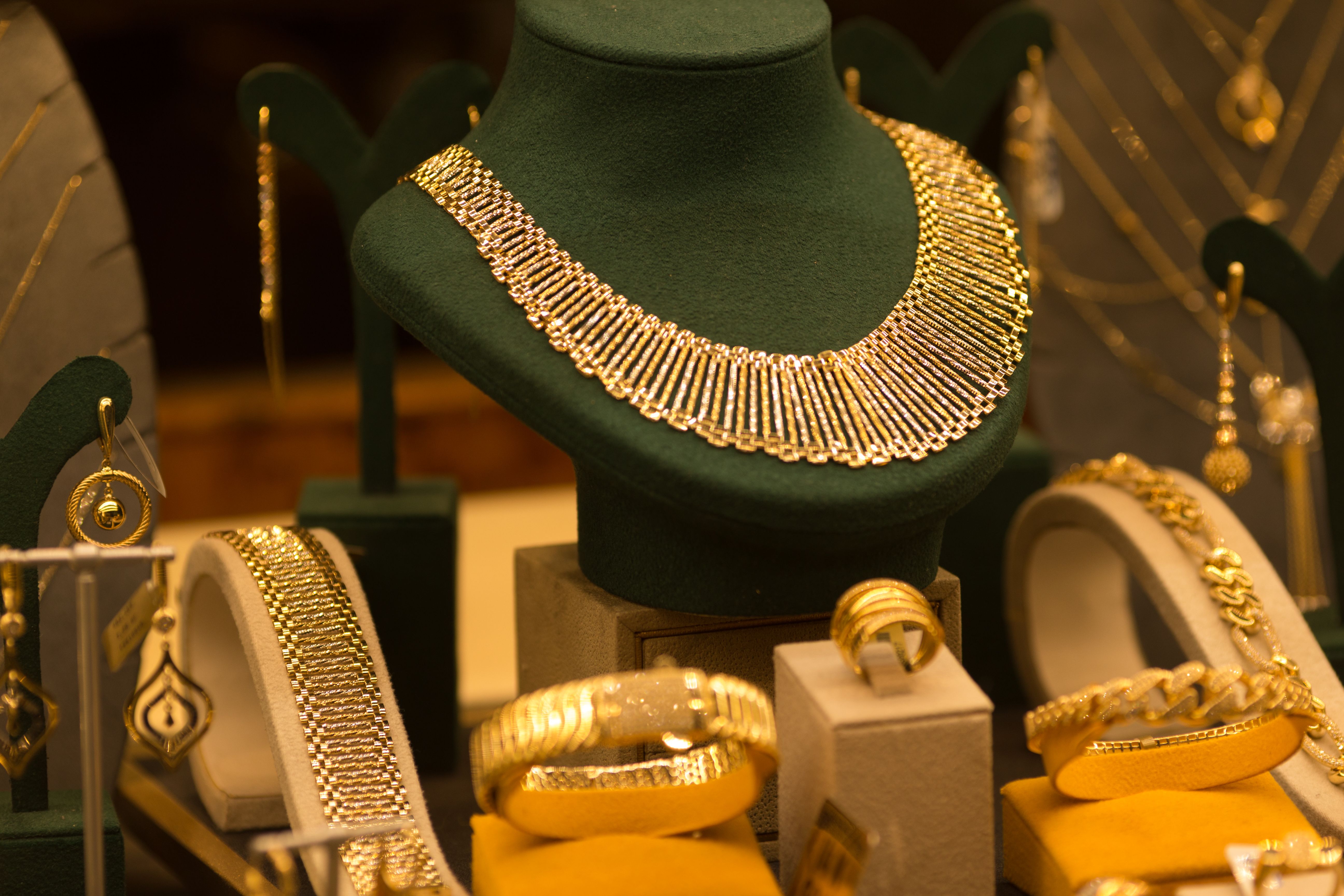 Jewelry and Gems Displayed in a Shop Window at Night