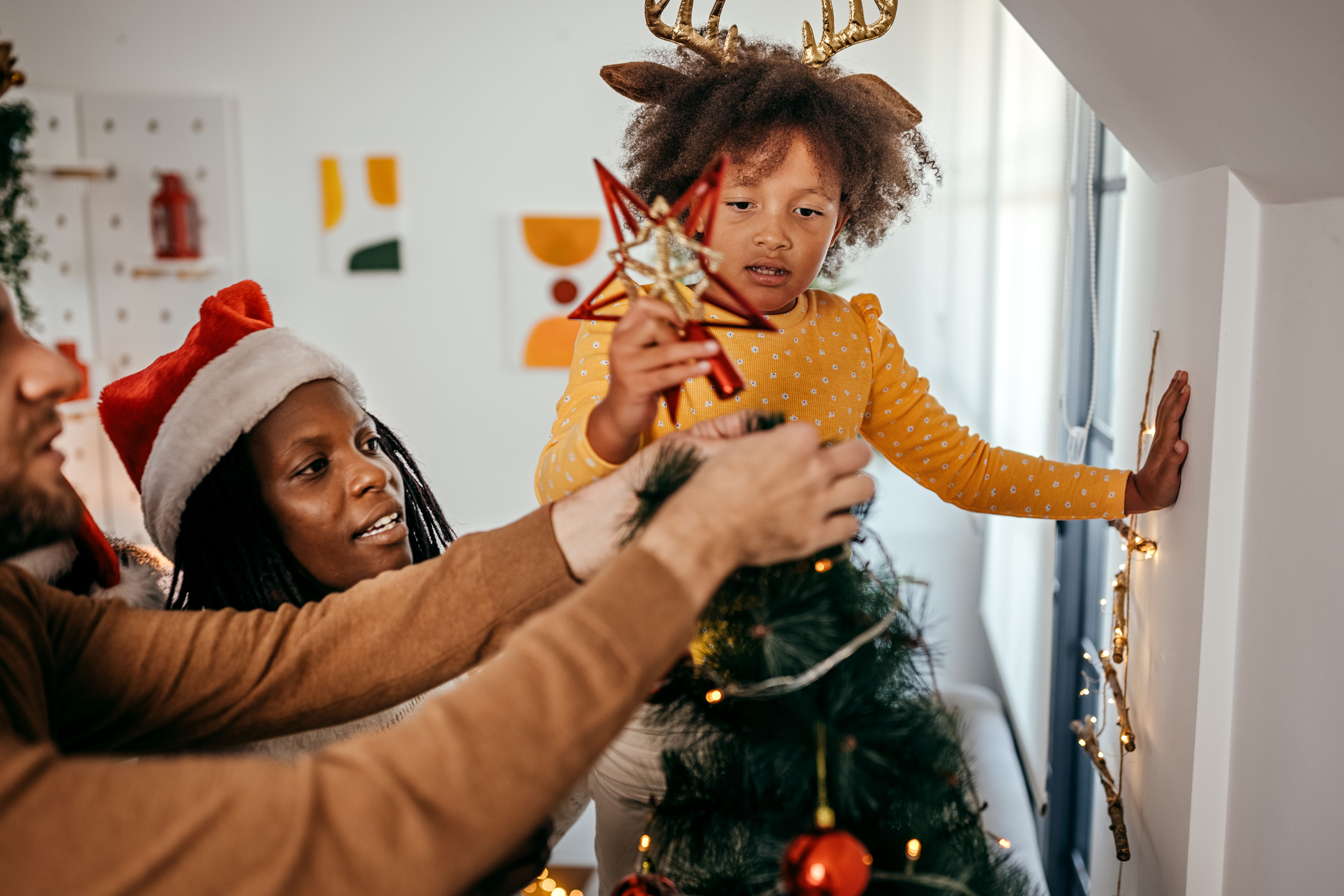 family decorating together