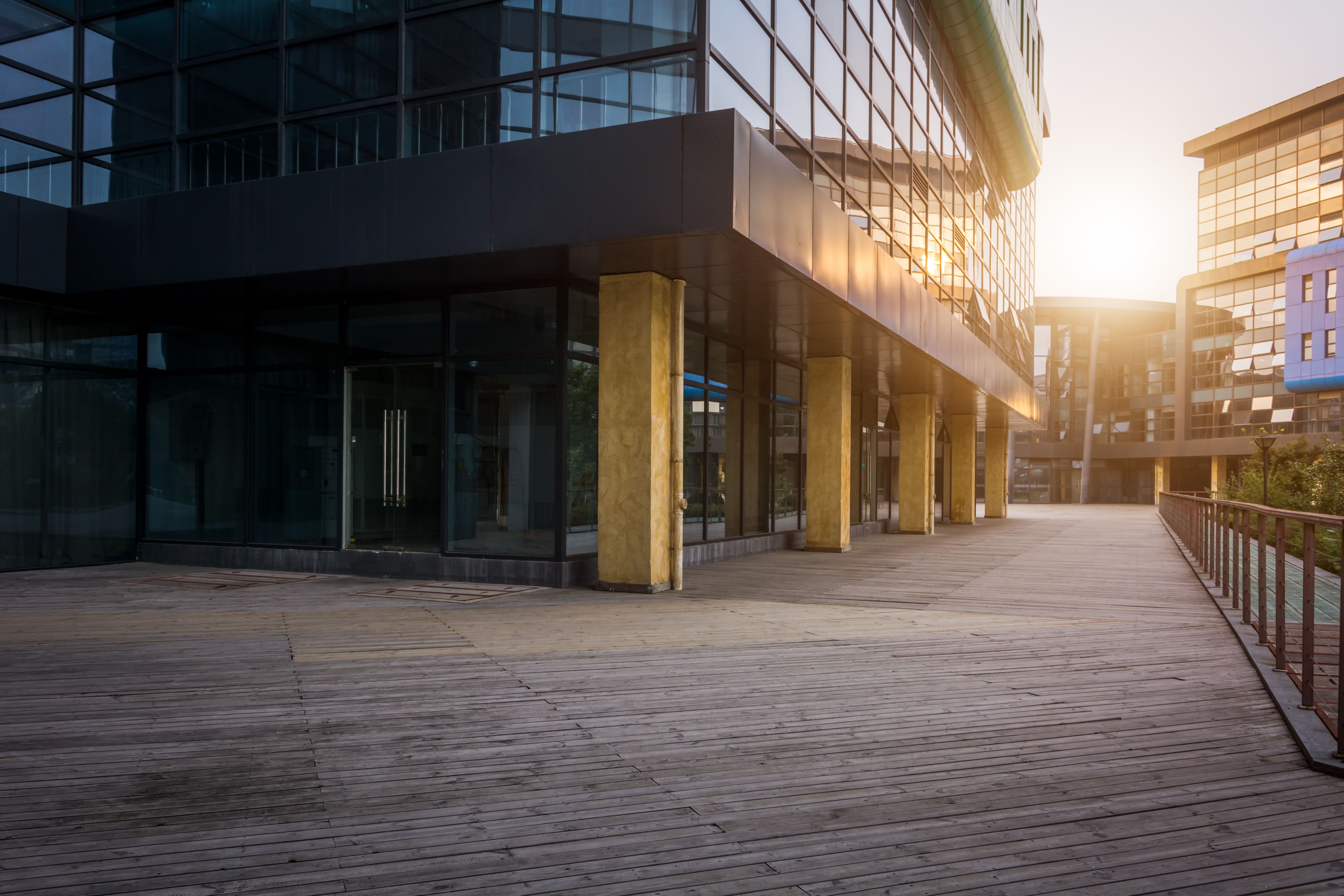 Captivating Modern Architecture Embraced by Warm Sunset Glow