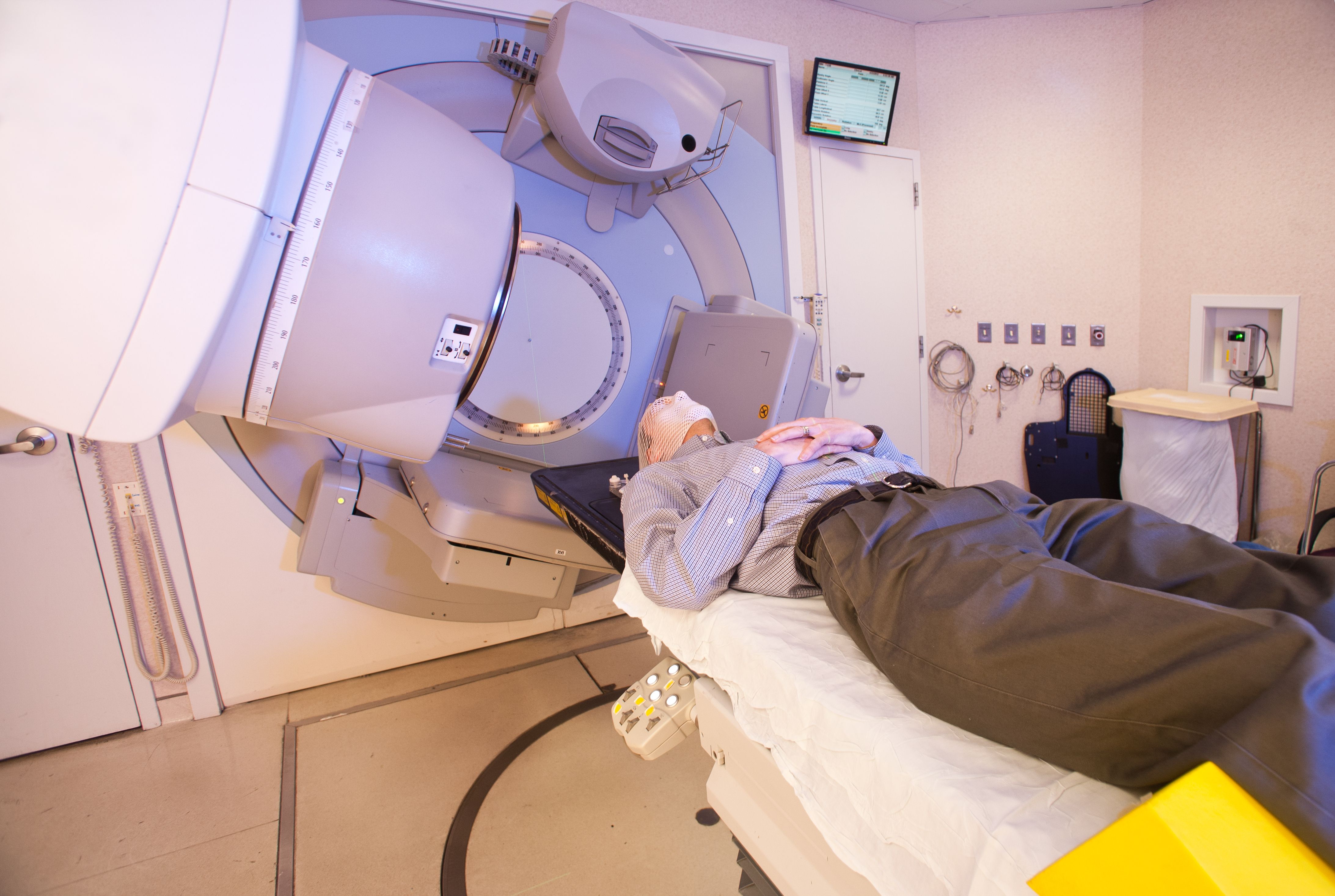 Radiation therapy mask over a patient's face Radiation therapy mask over a patient's face