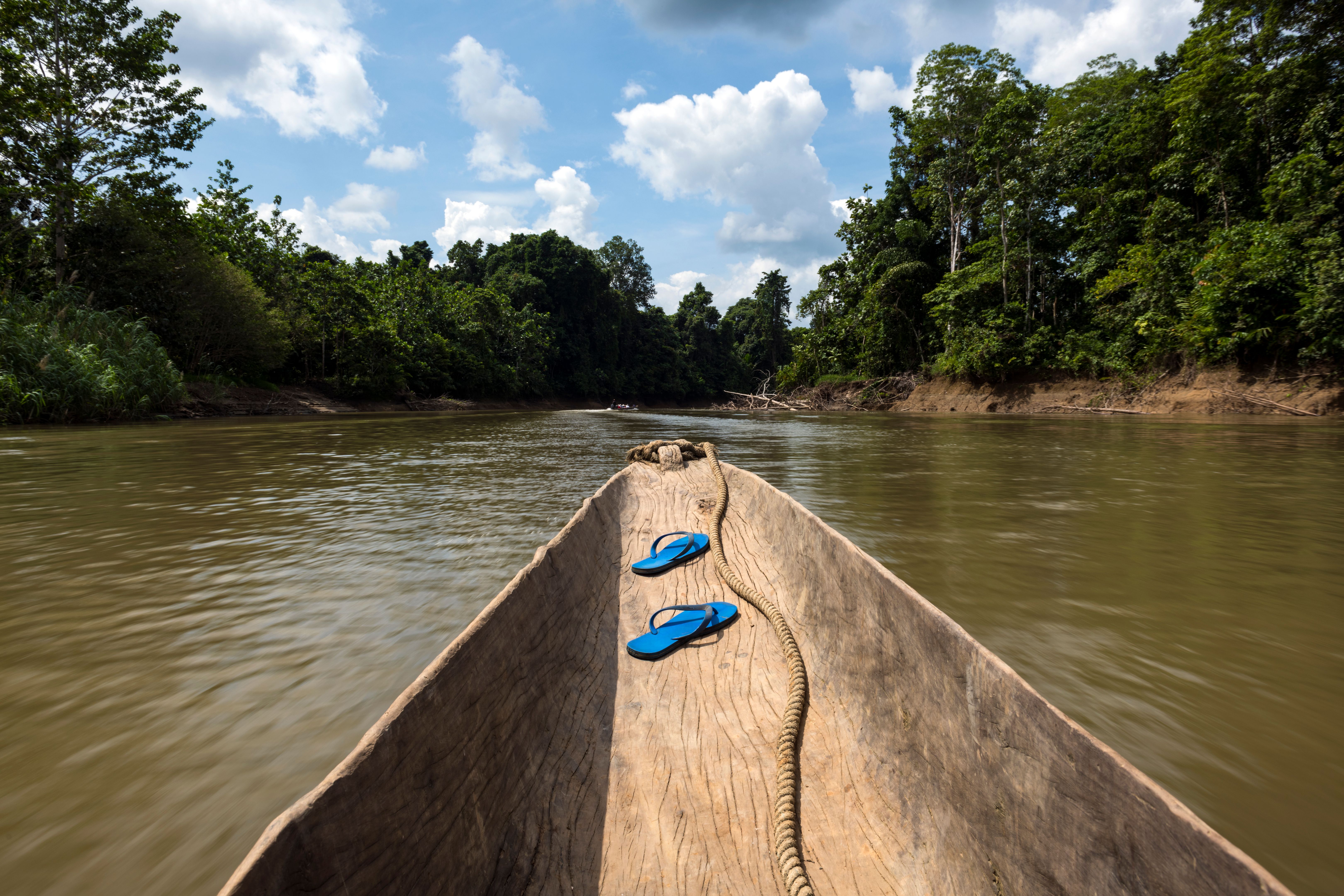 Traveling by dugout canoe in Papua New Guinea