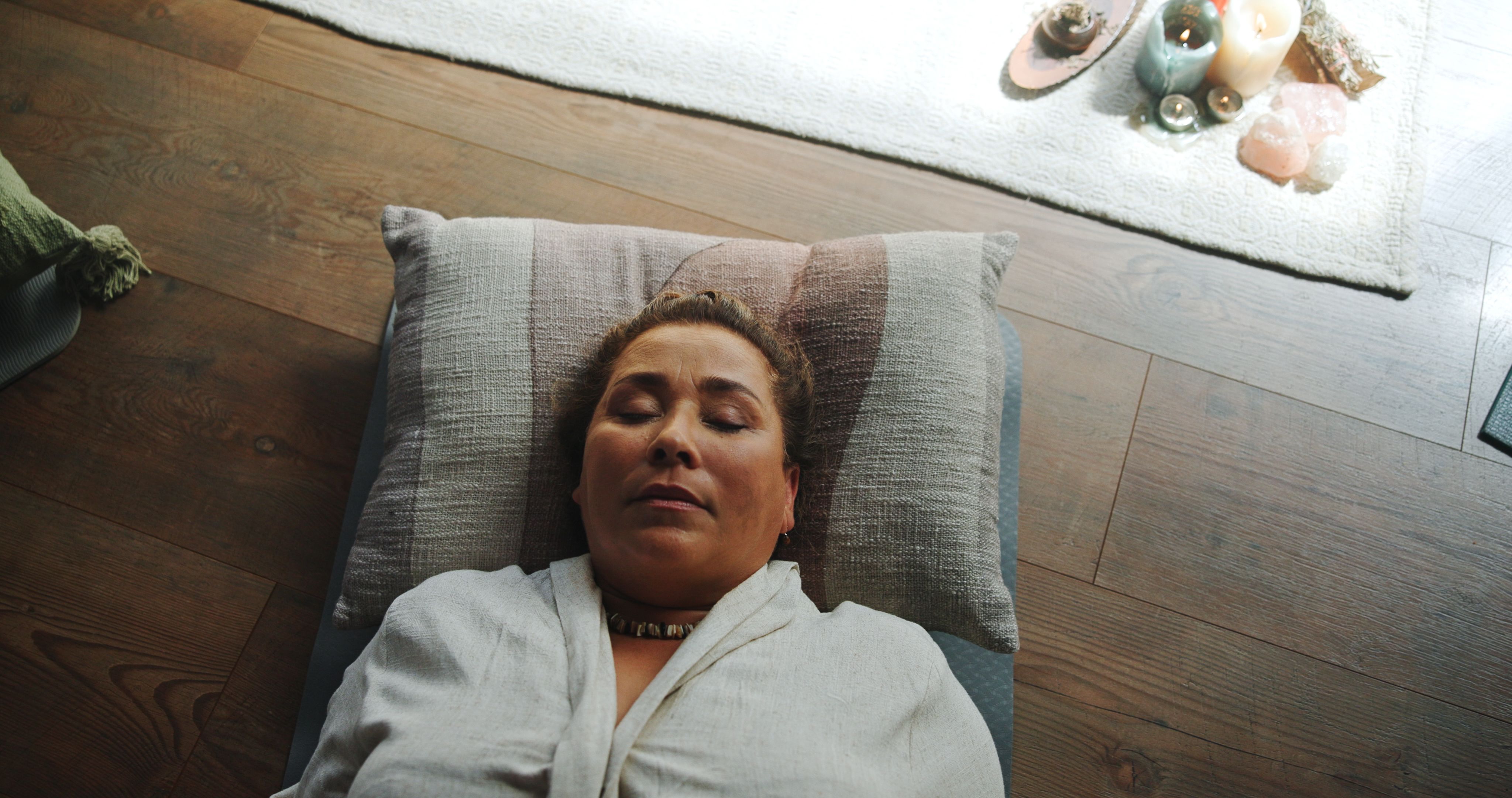 Relax, zen and woman at guided meditation class for mindfulness, peace and balance practice. Above, yoga nidra and female person at somatic healing session for wellness, health or trauma release. Relax, zen and woman at guided meditation class for mindfulness, peace and balance practice. Above, yoga nidra and female person at somatic healing session for wellness, health or trauma release.