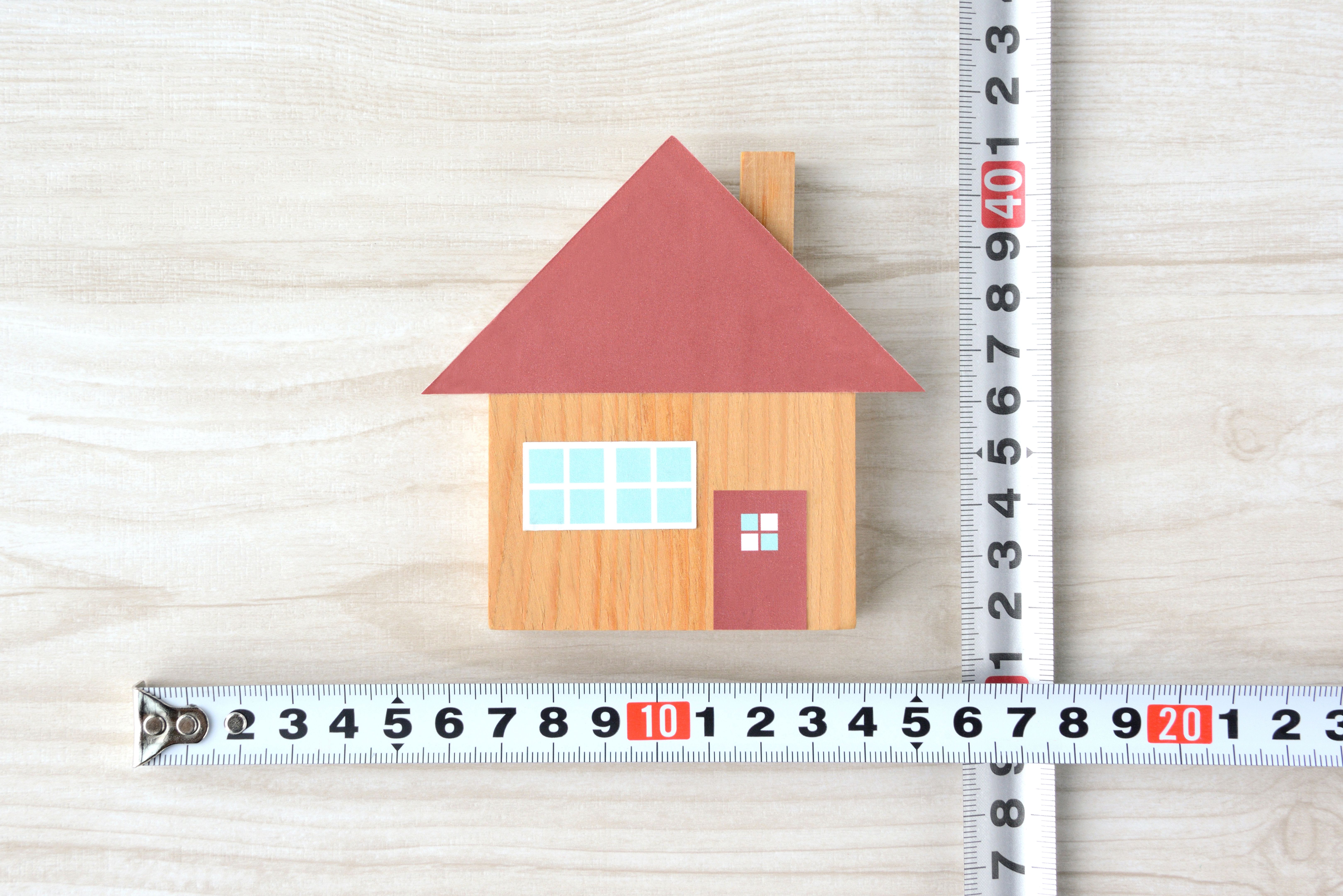 House object and tape measure, measuring house size images