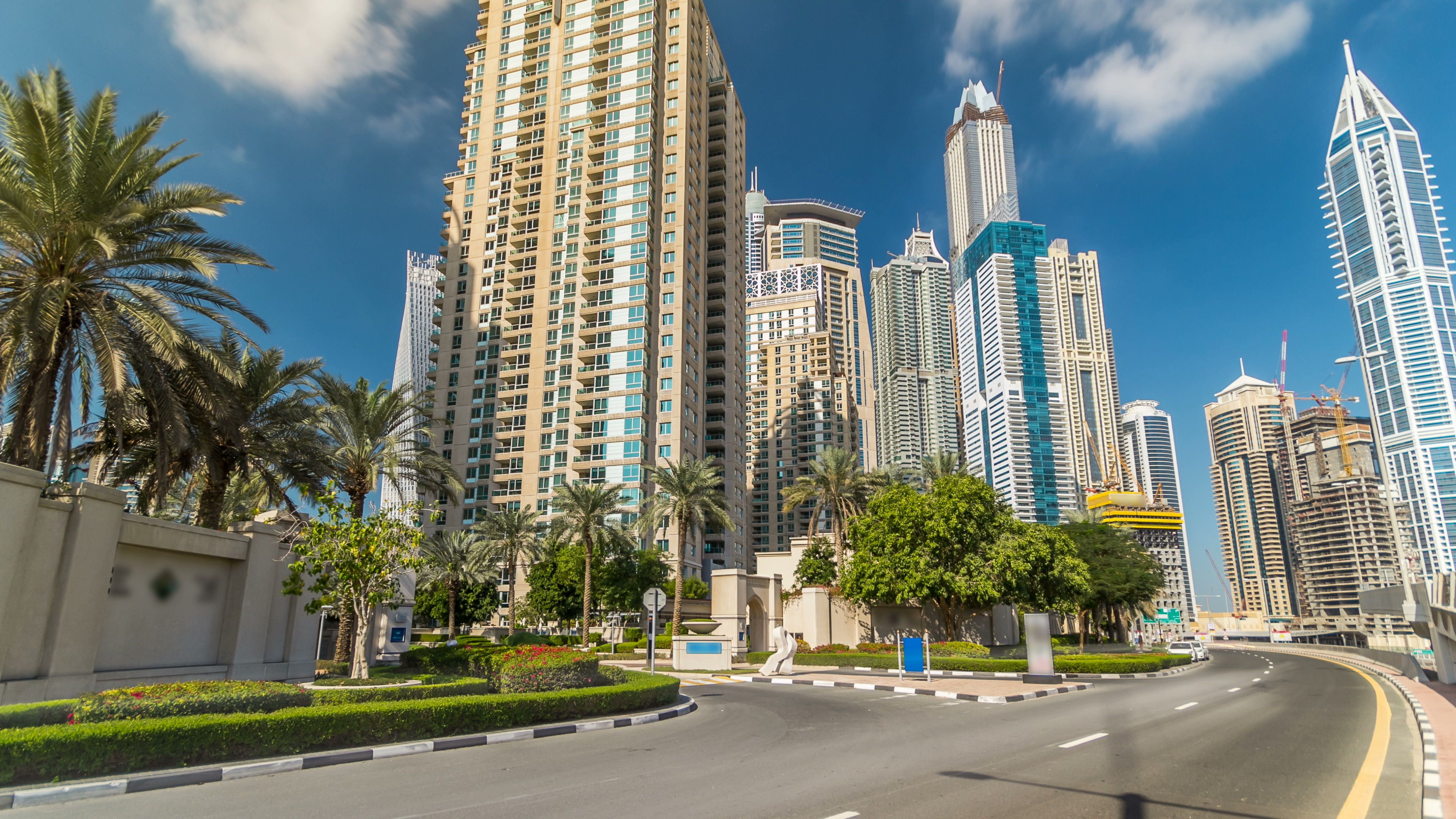 Hand girl holds the keys. The concept of buying an apartment or car in Dubai. Hand close-up Hand girl holds the keys. The concept of buying an apartment or car in Dubai. Hand close-up