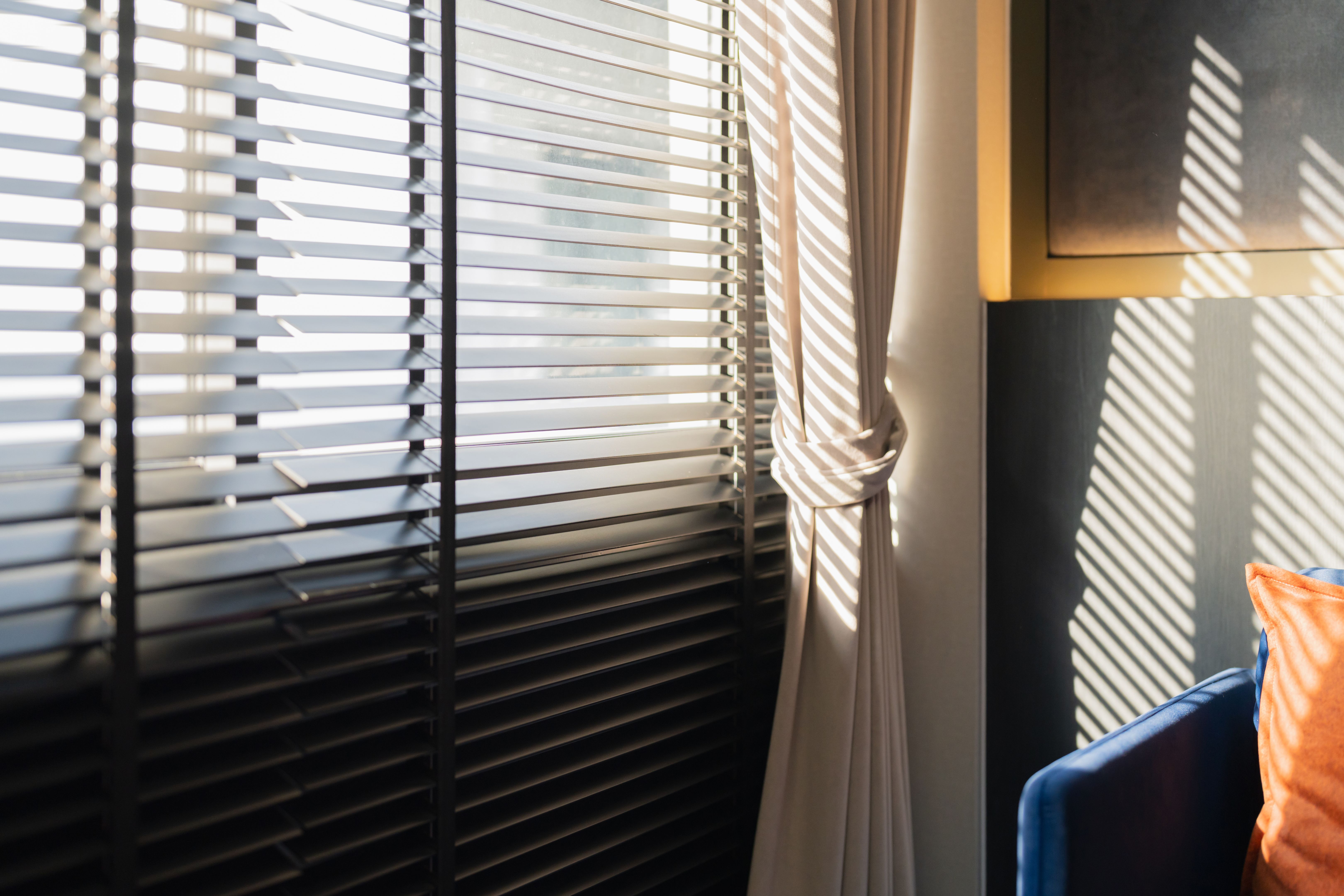 home interior design concept Natural Wooden window and White door frame with sunbeams shining in