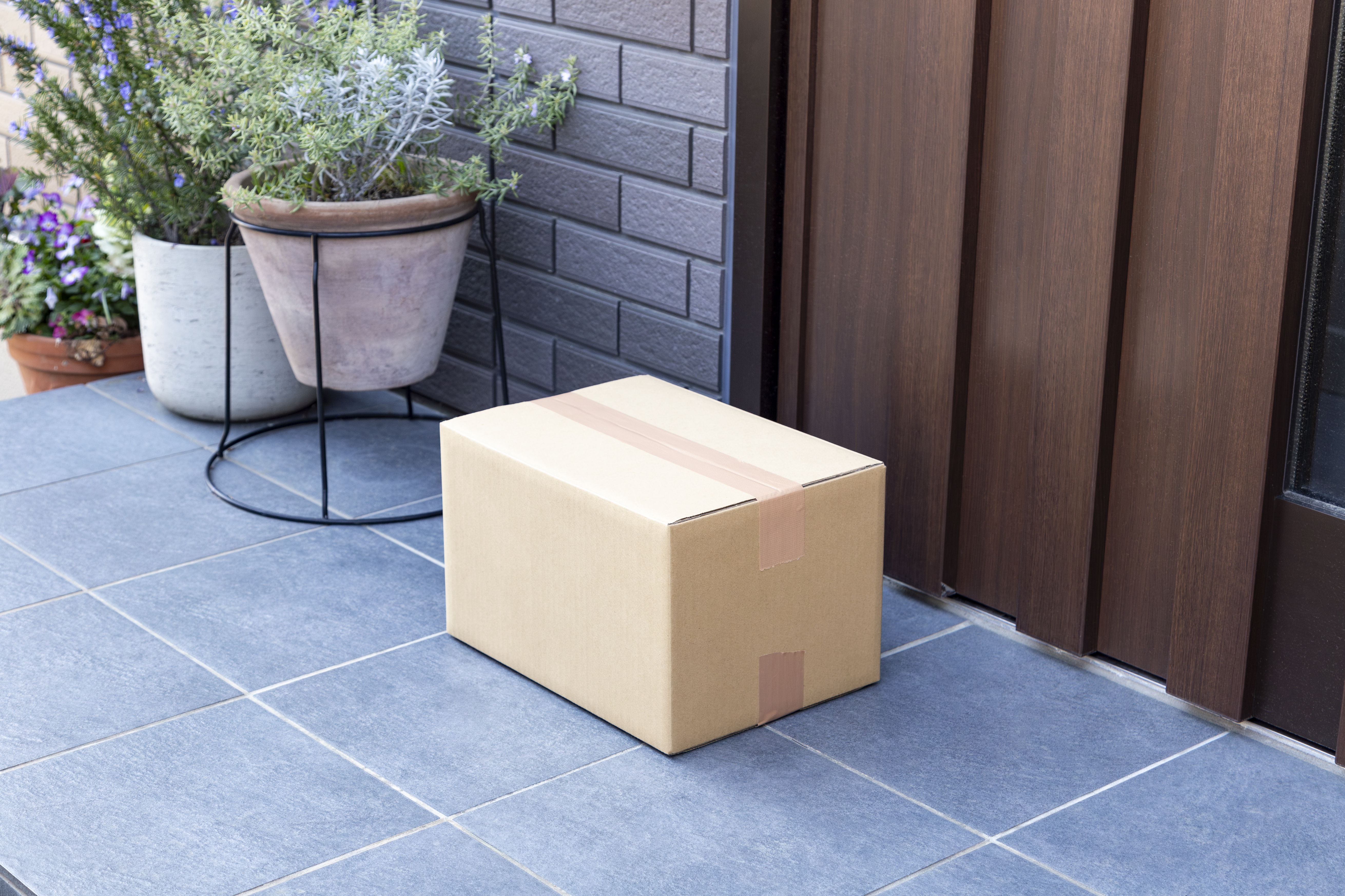 A cardboard box placed at the entrance.